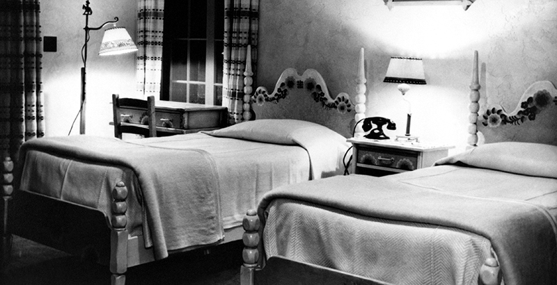 a bedroom with two beds