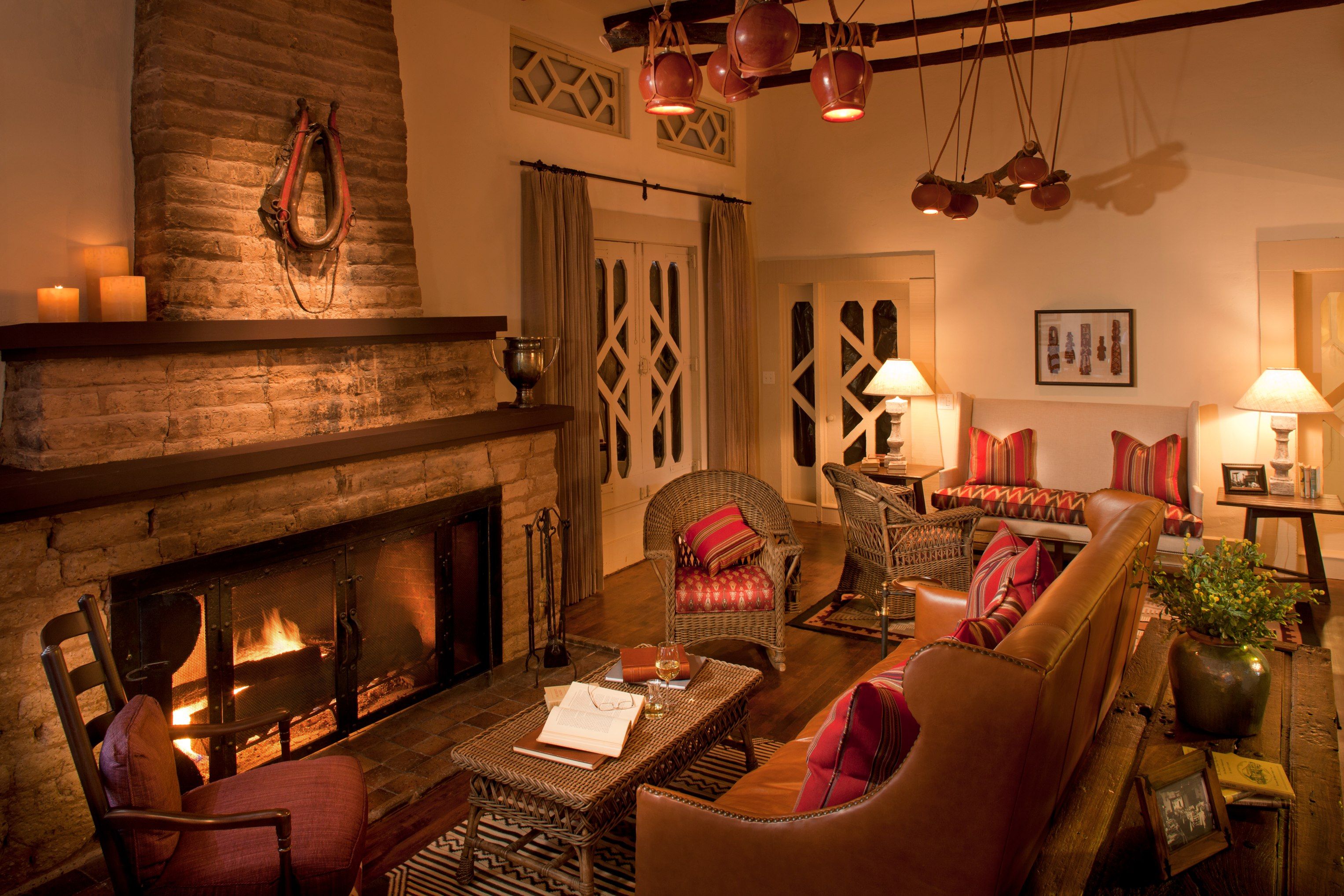 a living room with a fireplace and couches