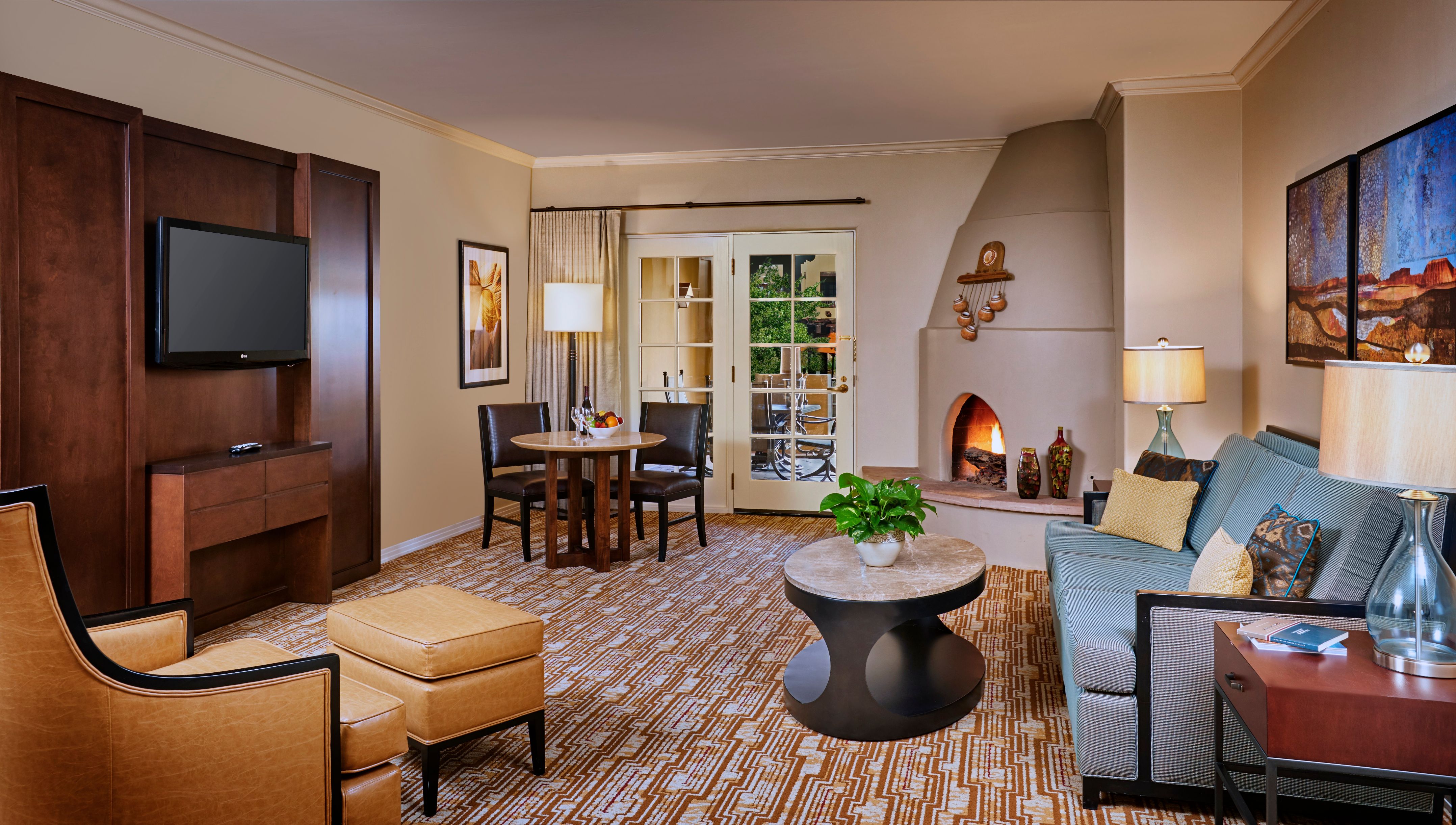 a living room with a fireplace and a couch