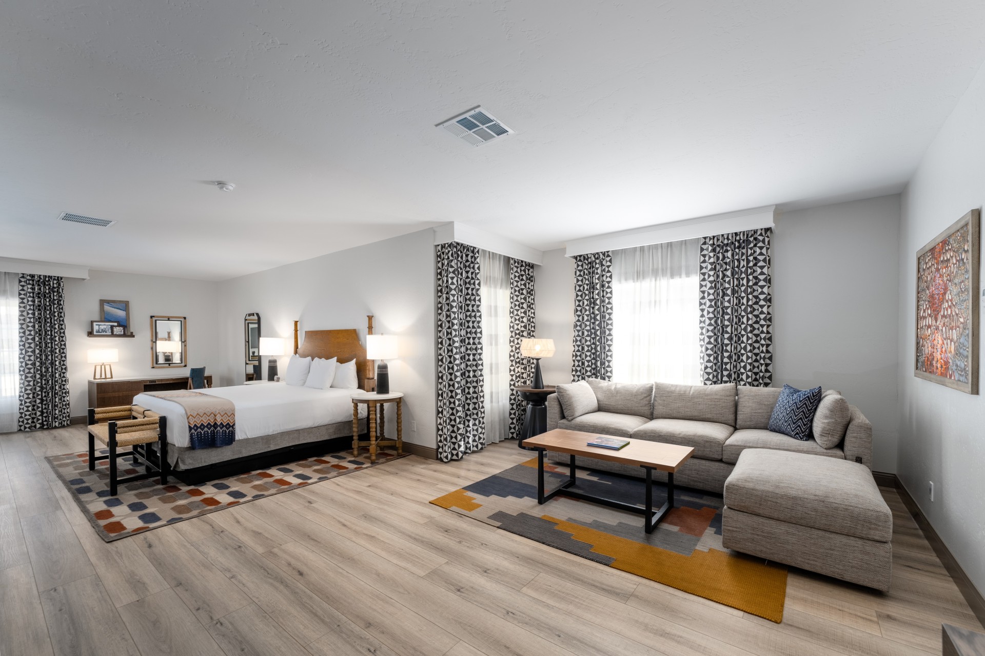 a room with a couch and a bed