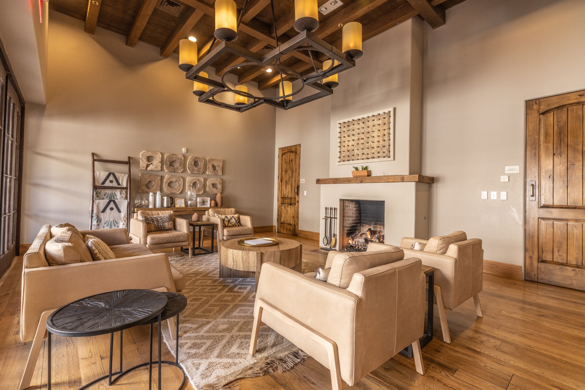 a room with a fireplace and couches
