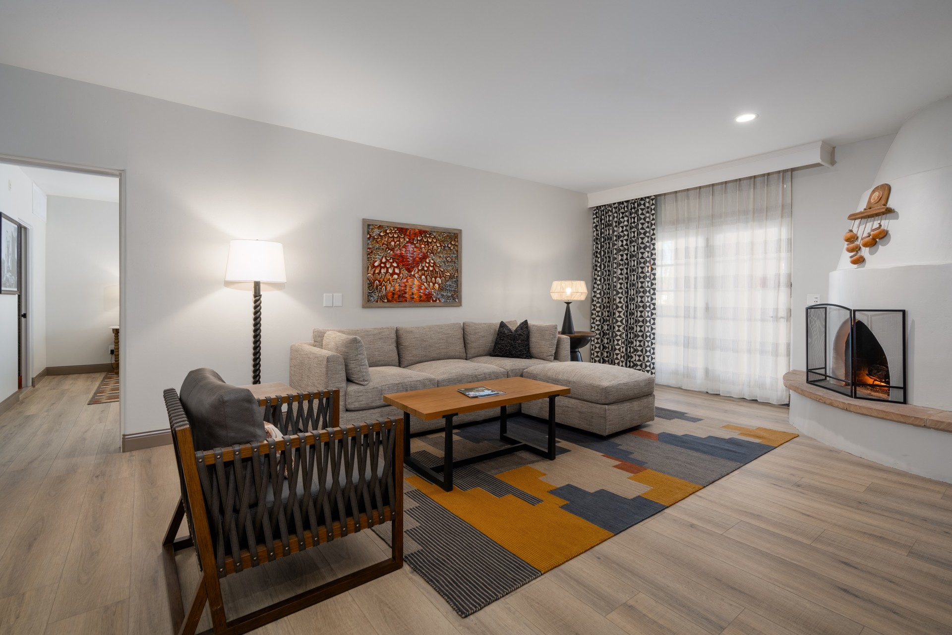 a living room with a couch and a table