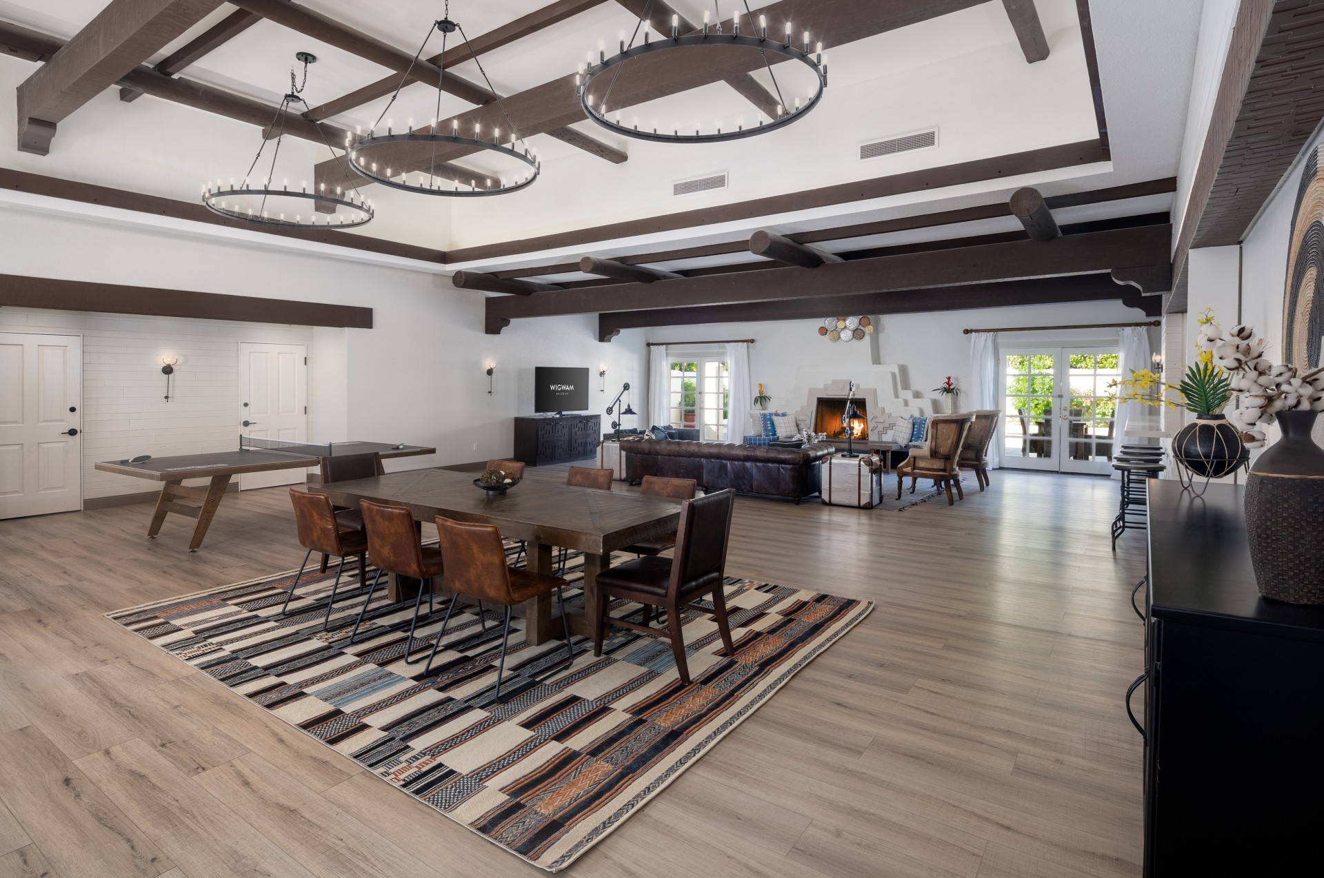 a large room with a table and chairs