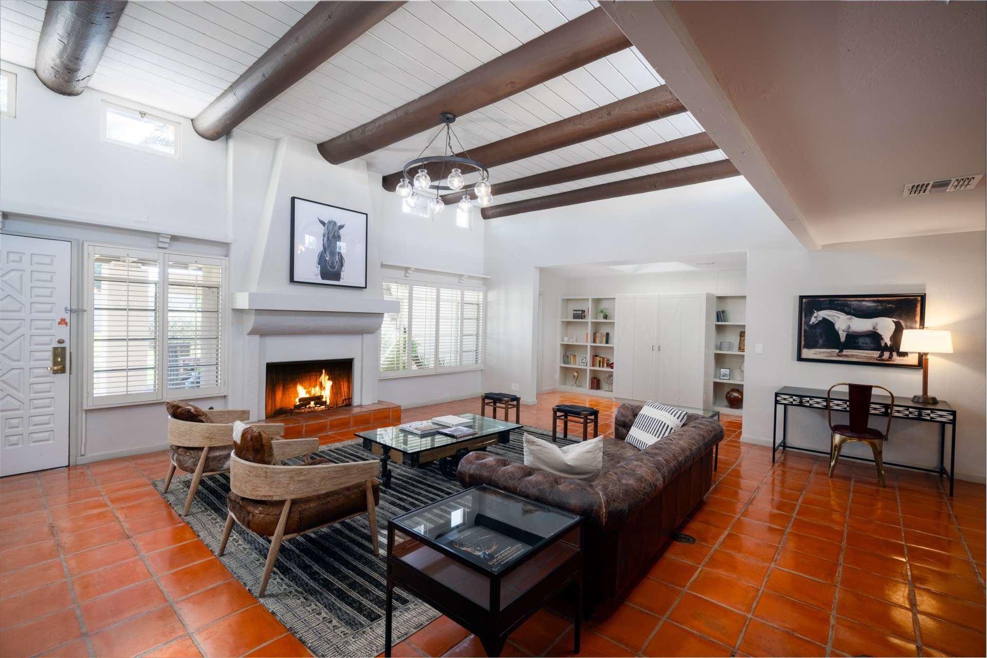 a living room with a fireplace and a couch