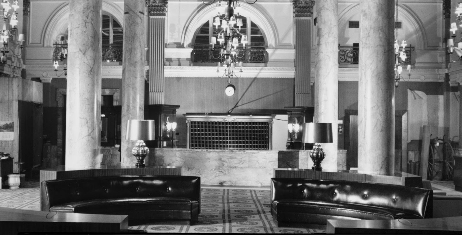 a black and white photo of a lobby