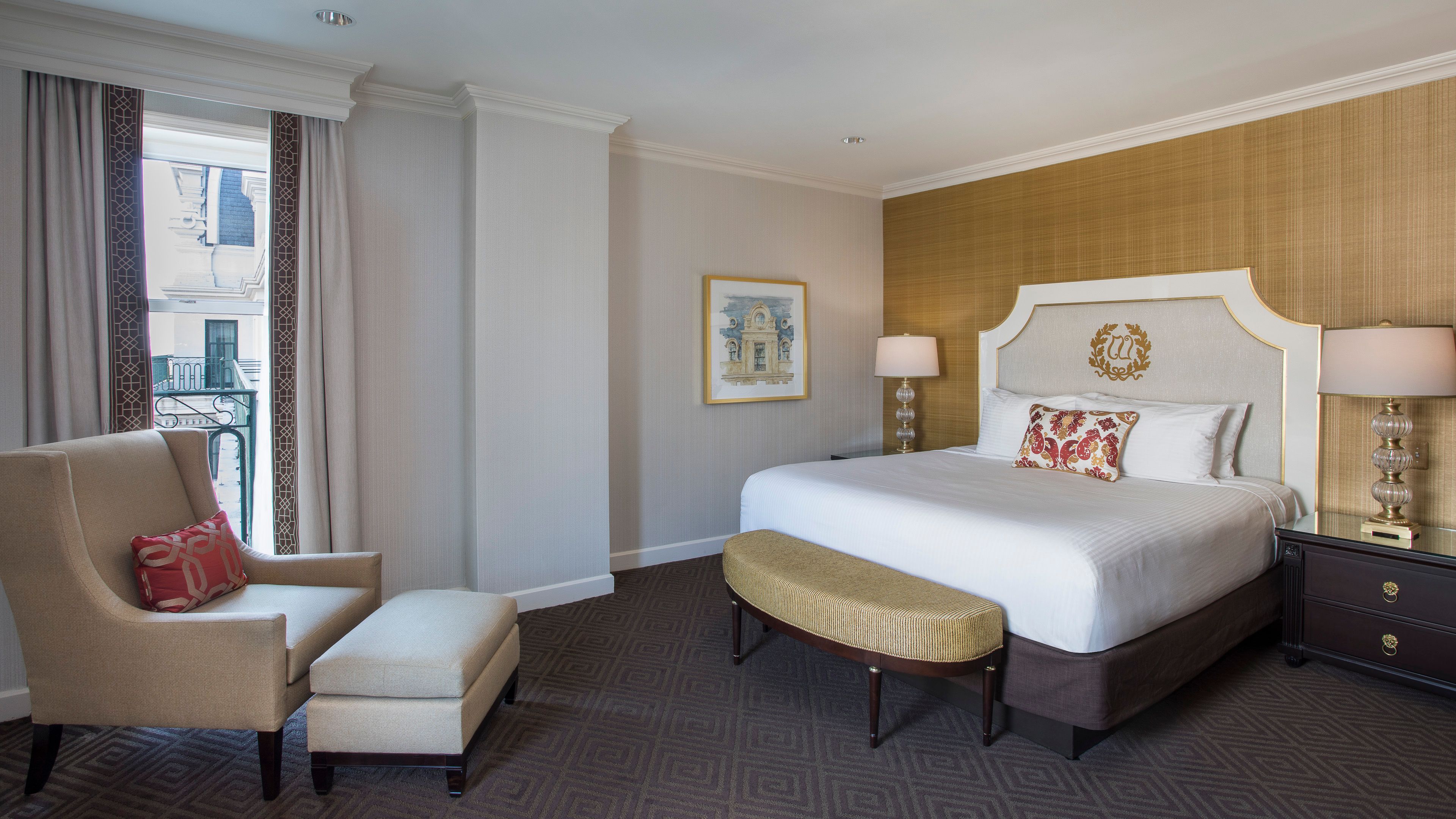 a bedroom with a bed and a chair