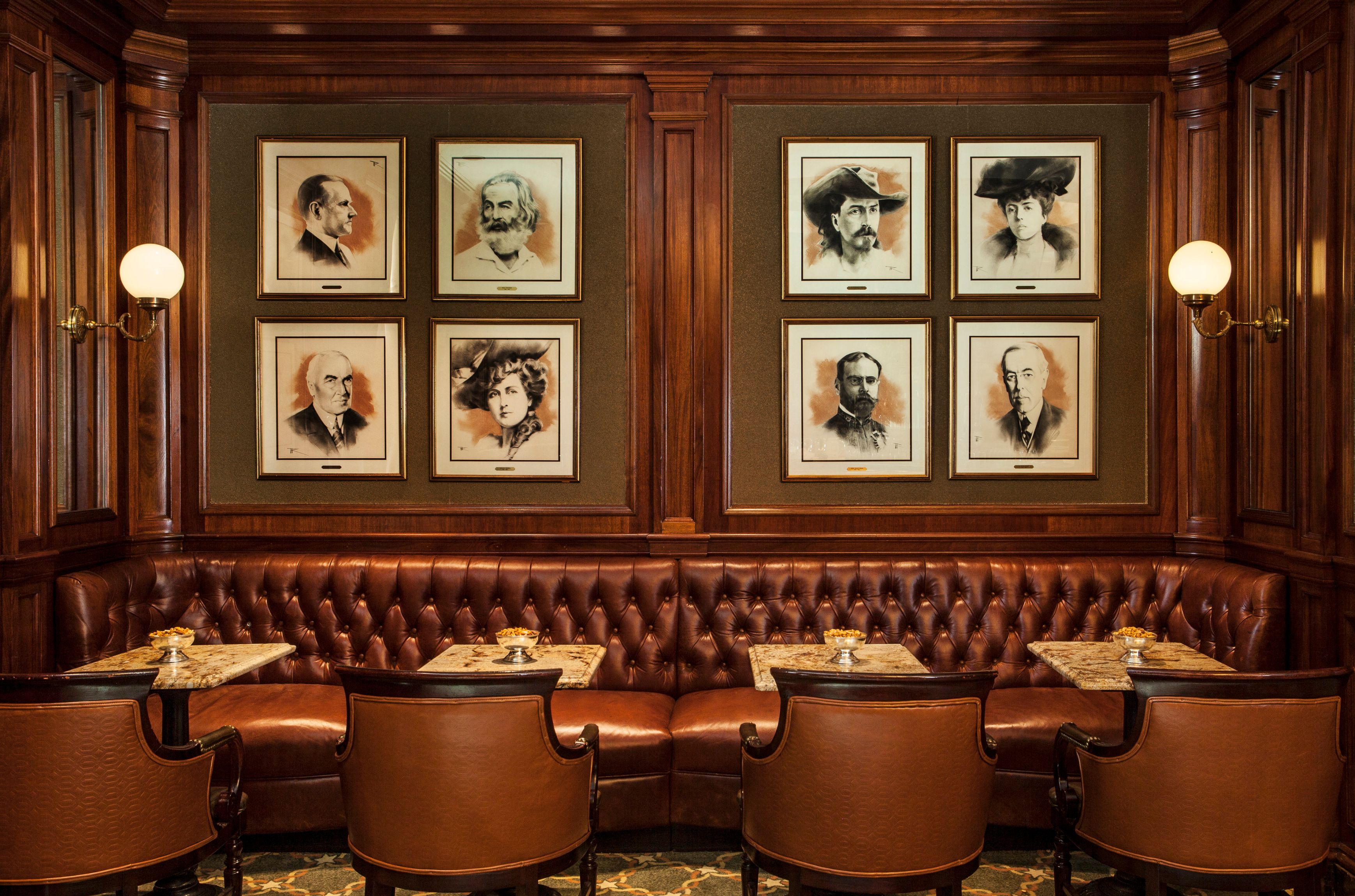 a group of pictures on the wall of a restaurant
