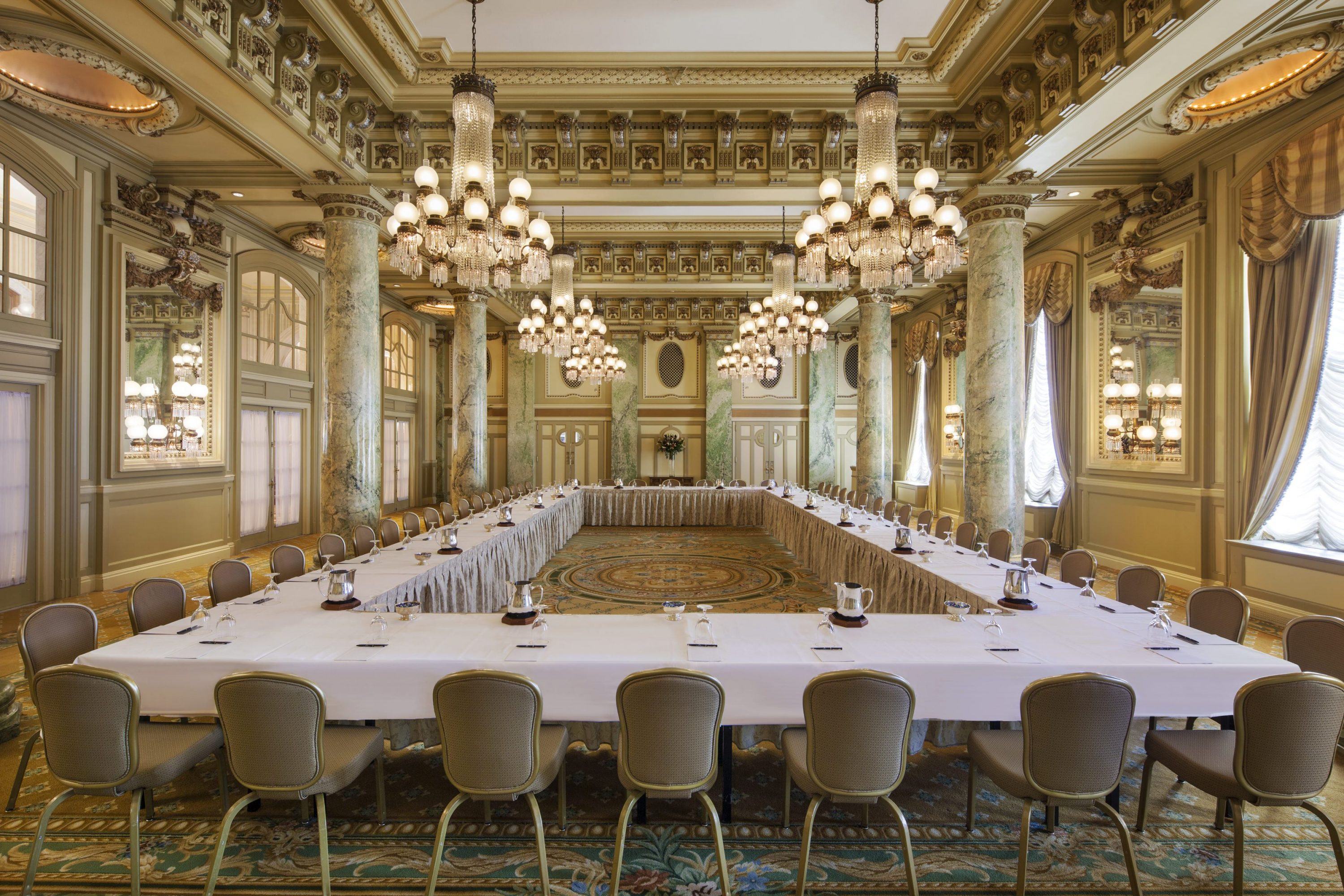 a large room with a large table and chairs