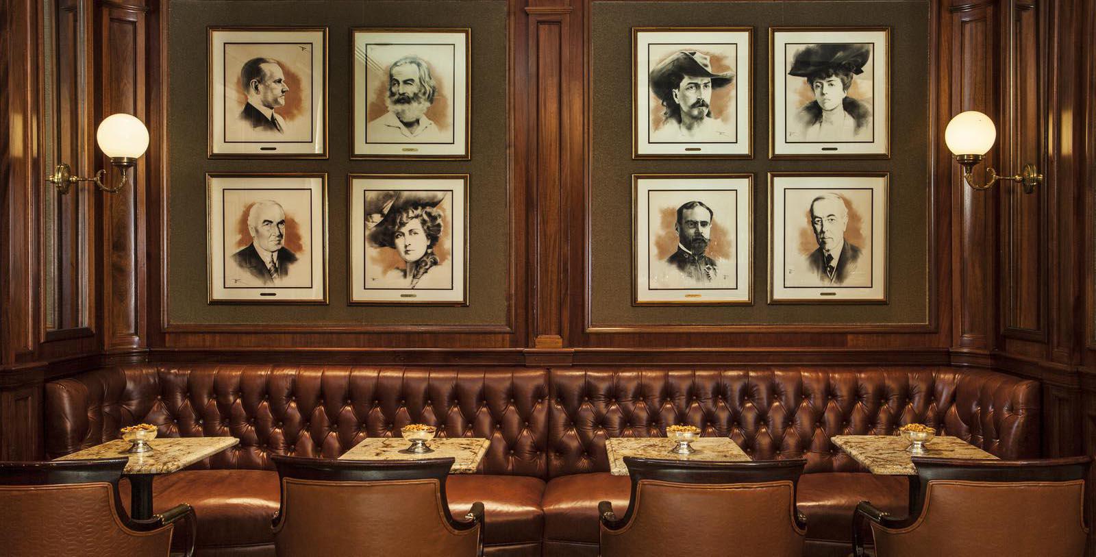 a group of framed pictures on a wall