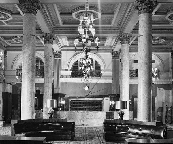 a black and white photo of a lobby