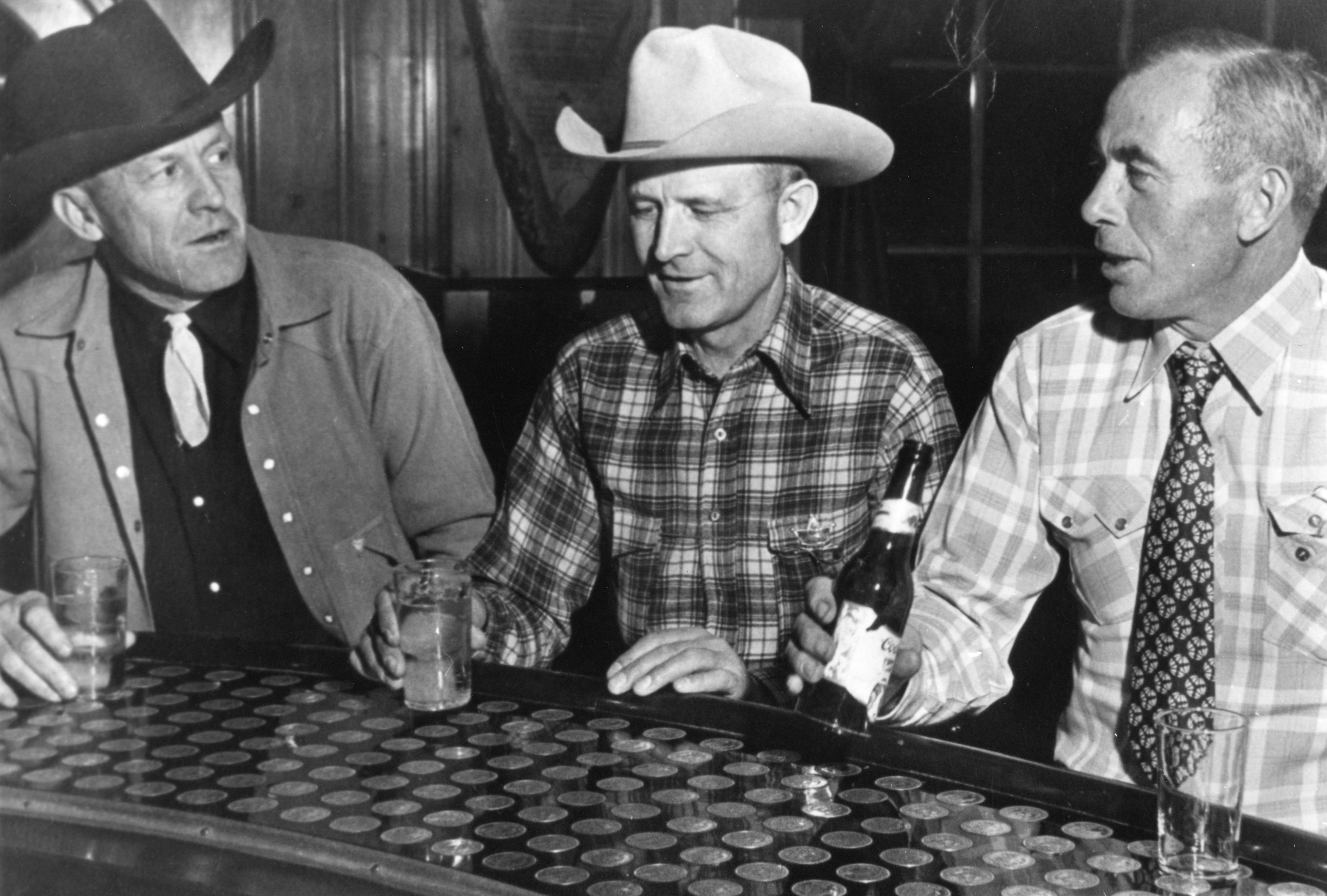 historical image of drinks at silver dollar bar the wort hotel jackson wyoming_high
