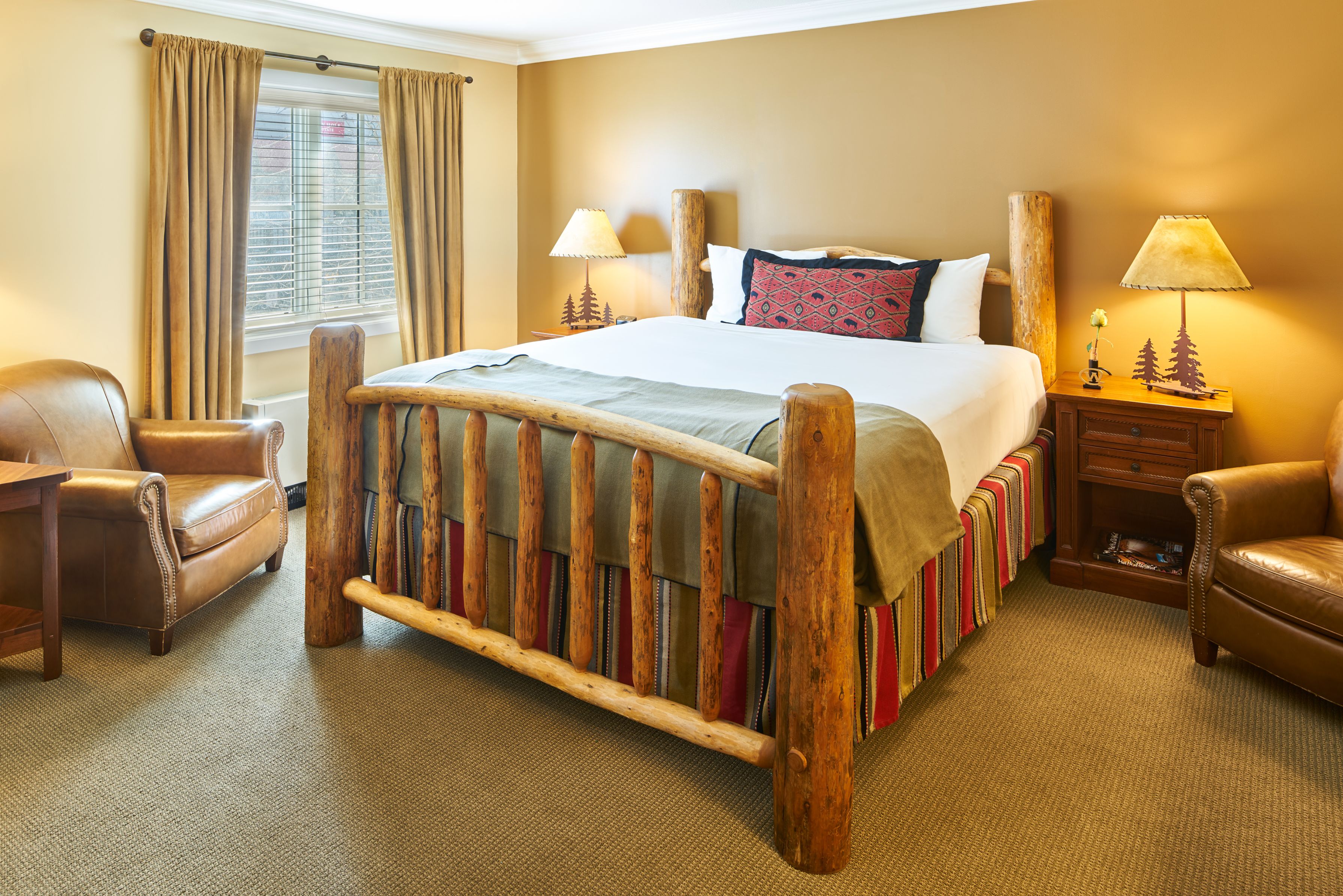 image of deluxe guestroom with one bed the wort hotel jackson wyoming_high