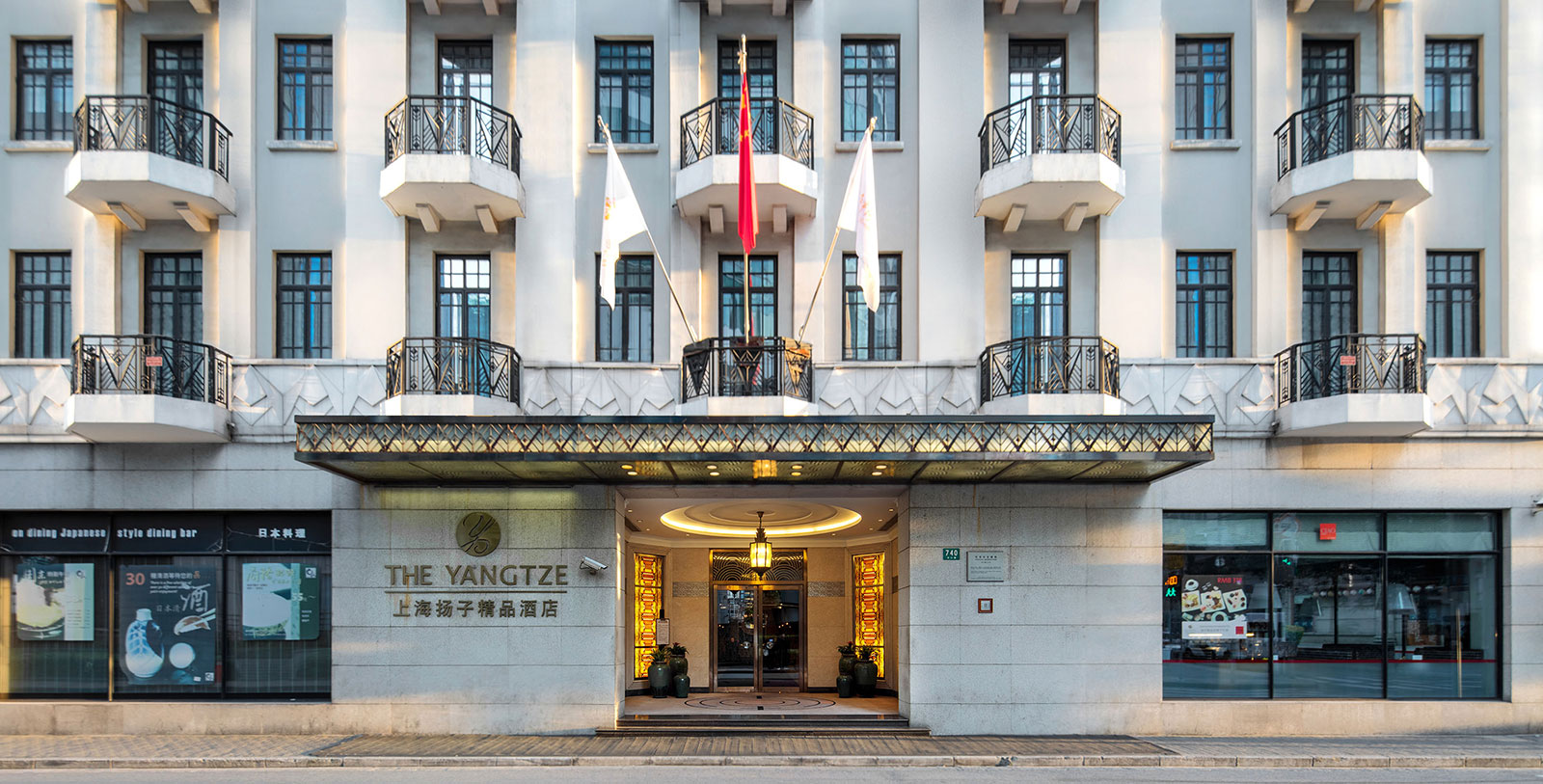 a building with flags on the front