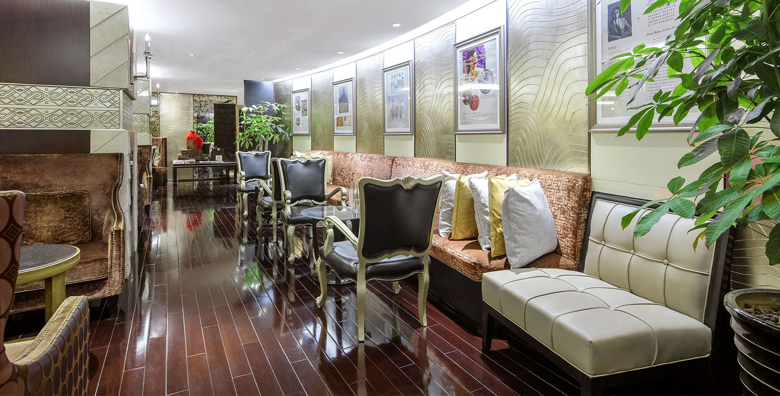 a room with a long bench and tables