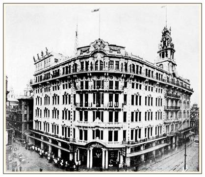 a large building with a flag on top