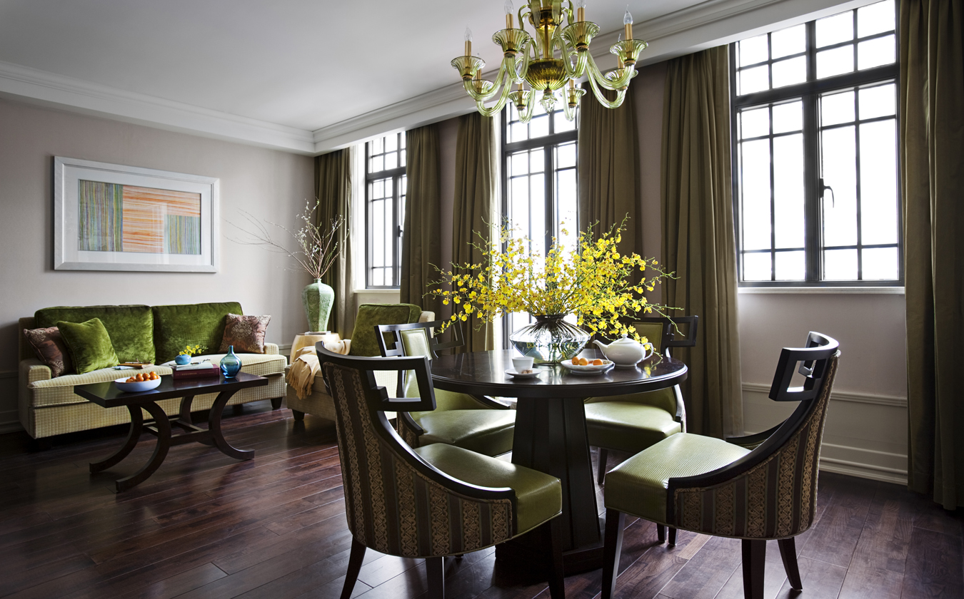 a room with a table and chairs