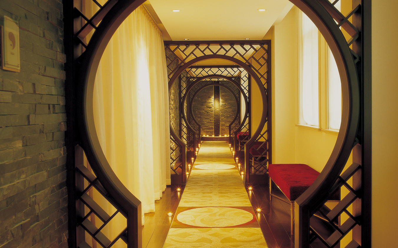 a hallway with a circular archway