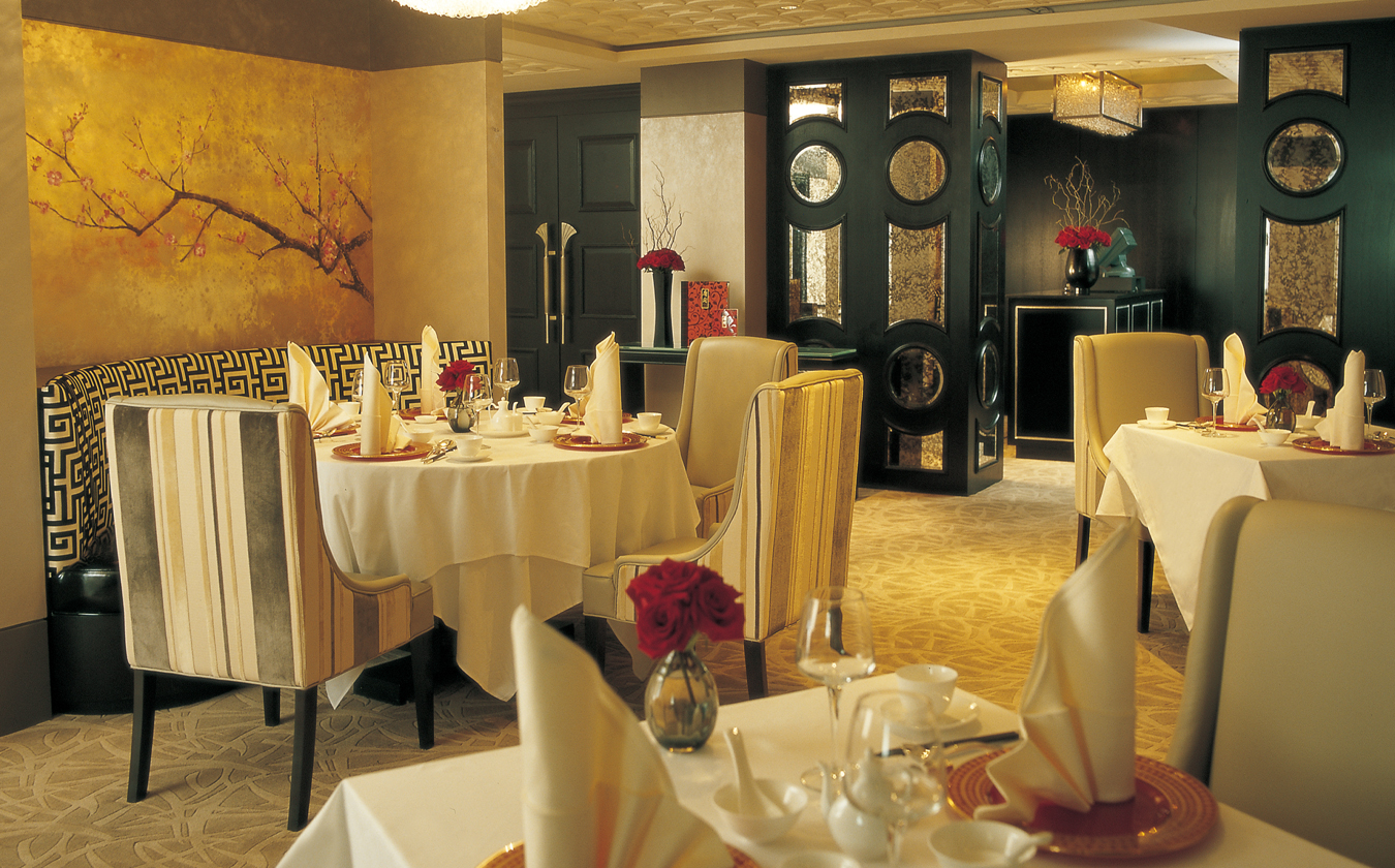 a restaurant with tables and chairs