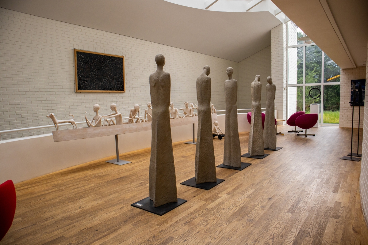 a group of statues in a room