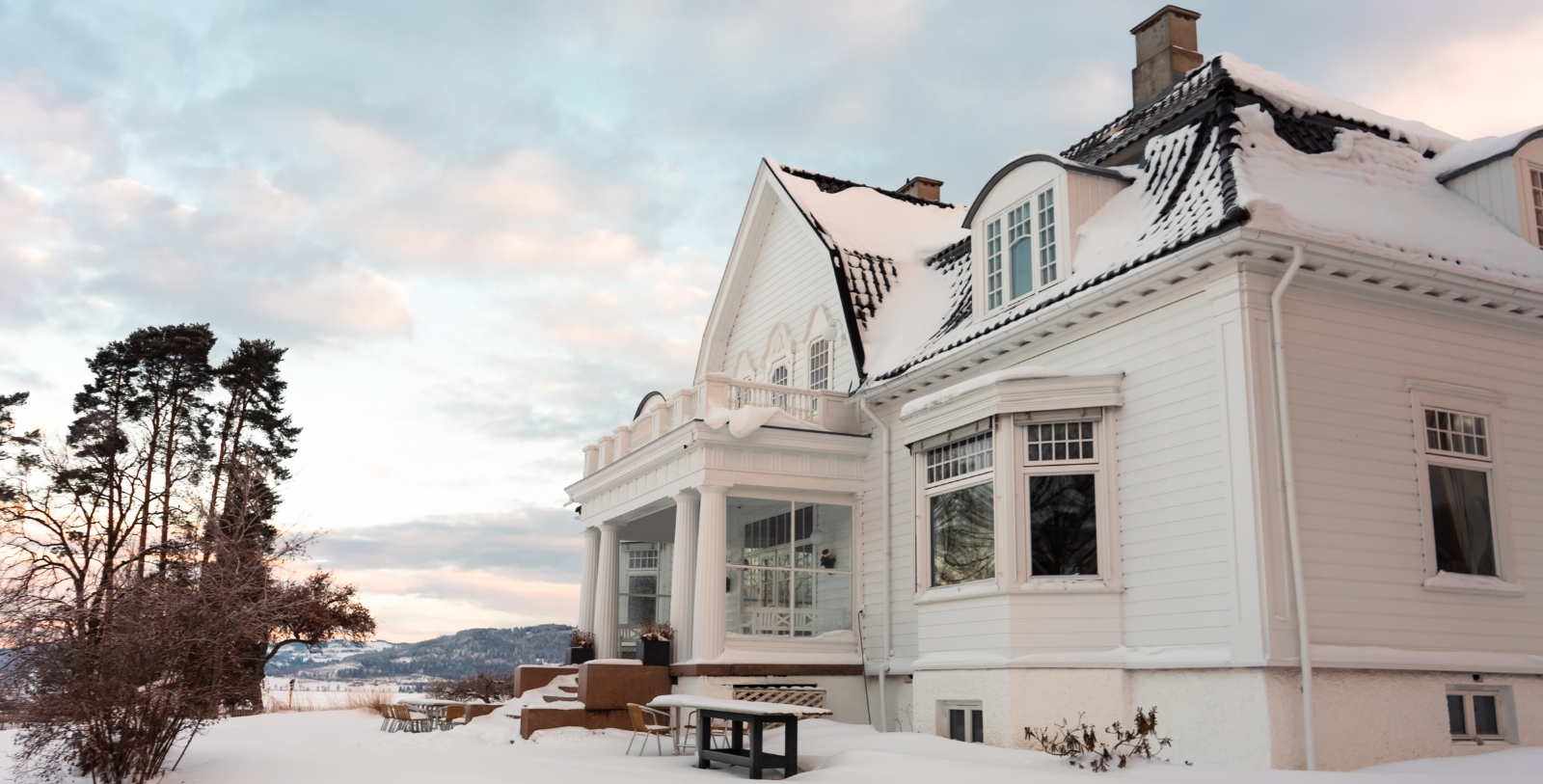 a house with snow on the ground