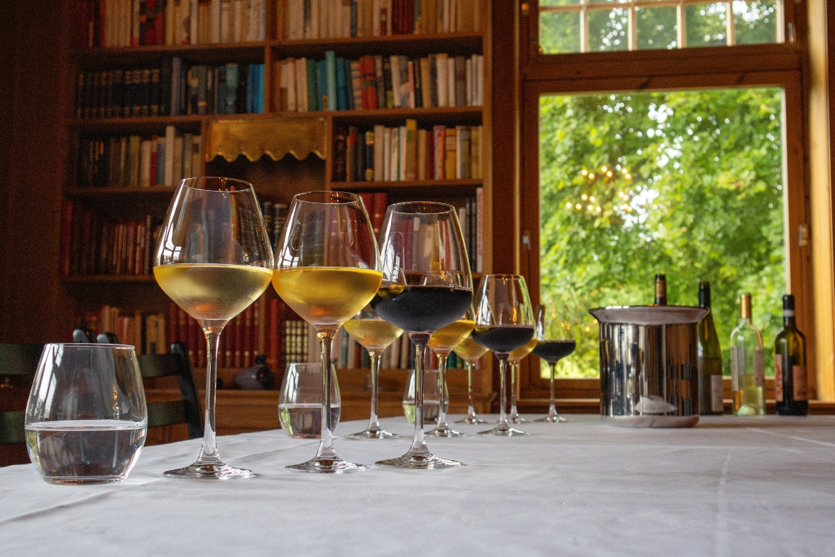 a group of wine glasses on a table