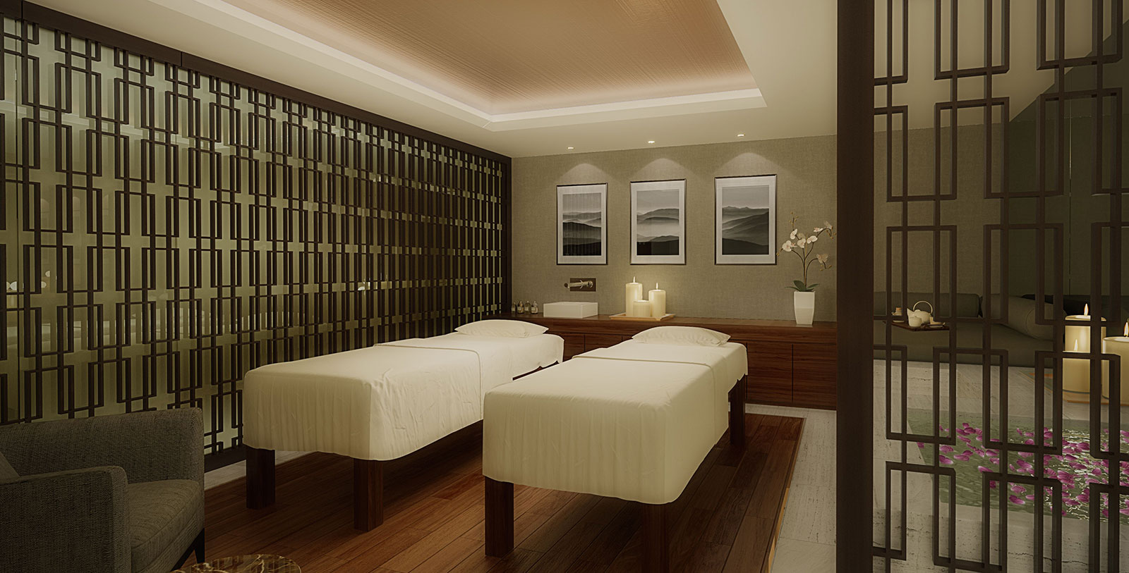 a room with beds and pictures on the wall