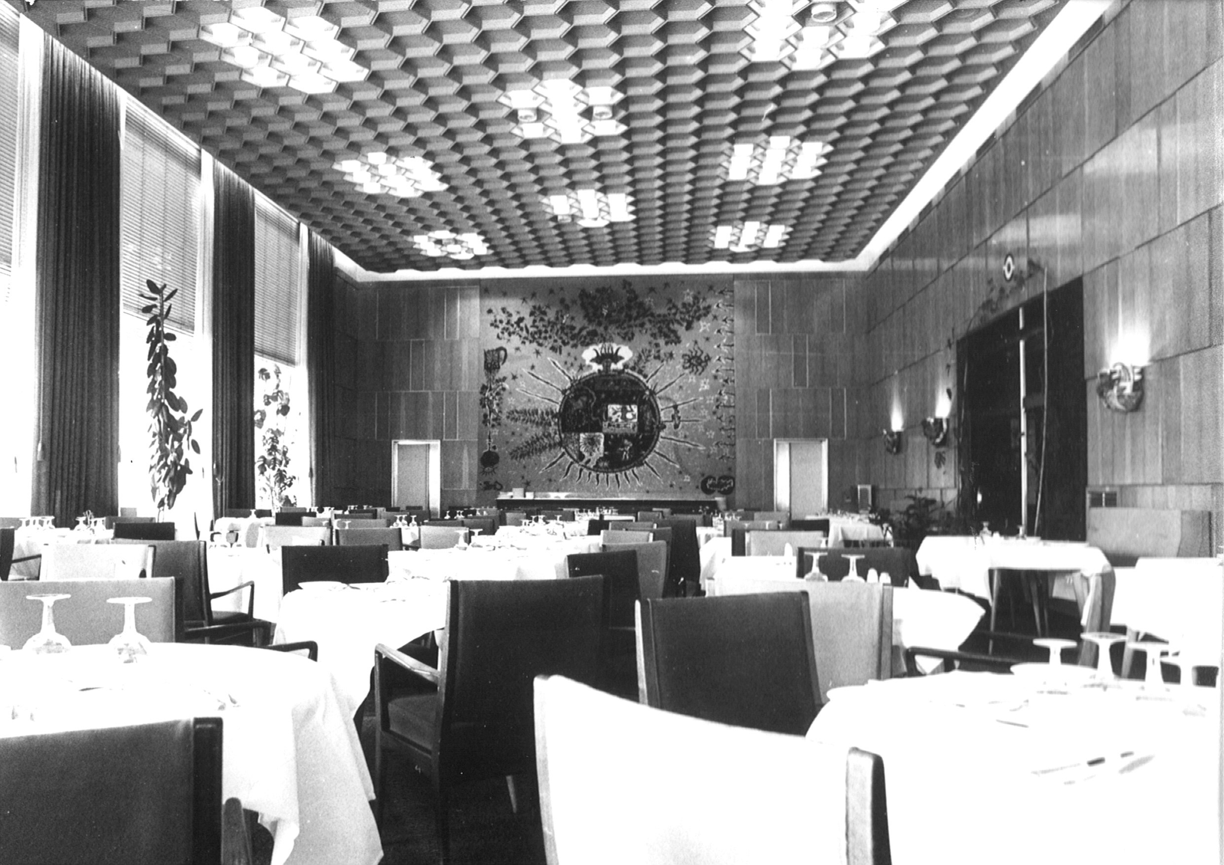 a room with tables and chairs