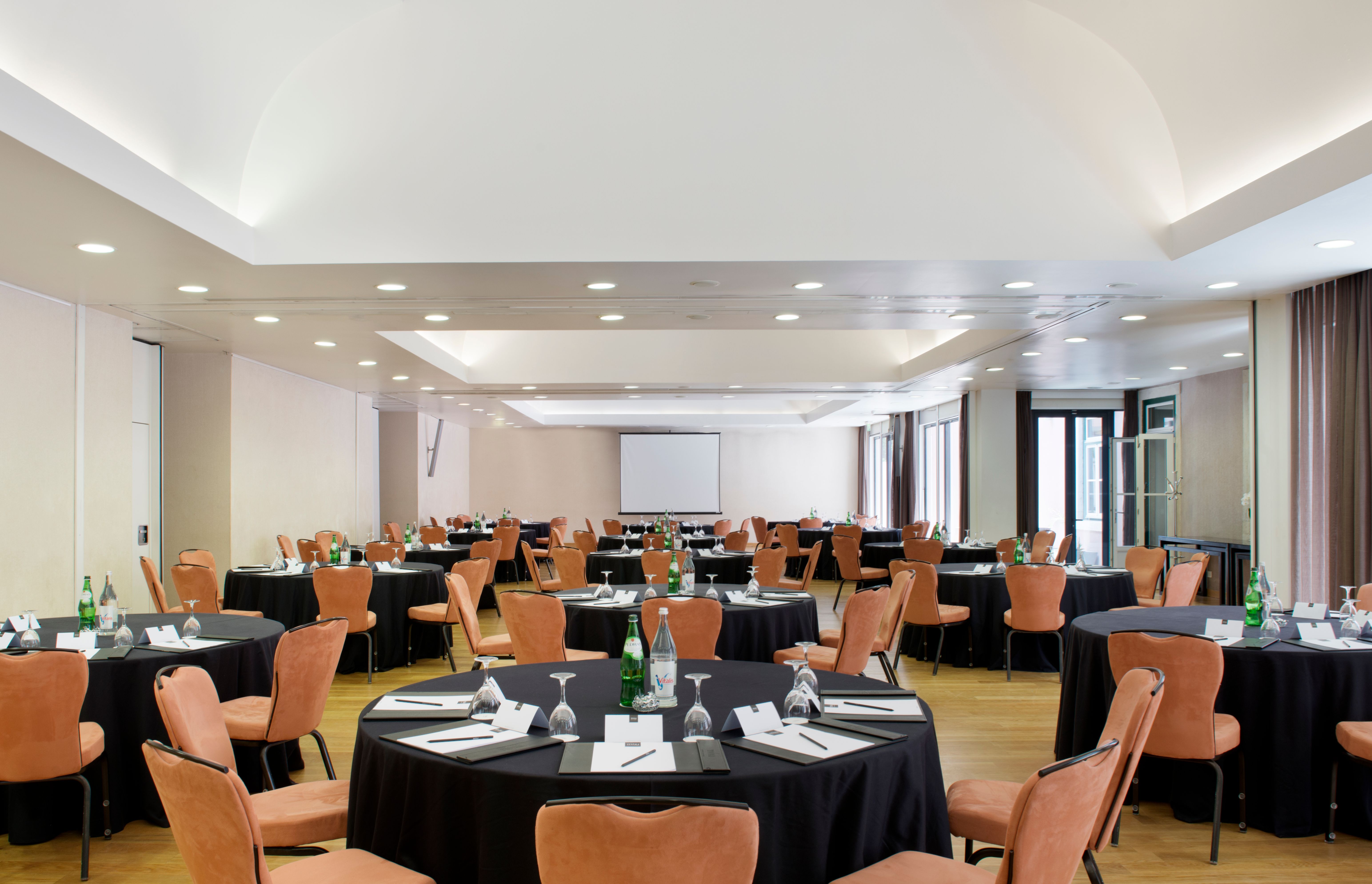 a room with tables and chairs