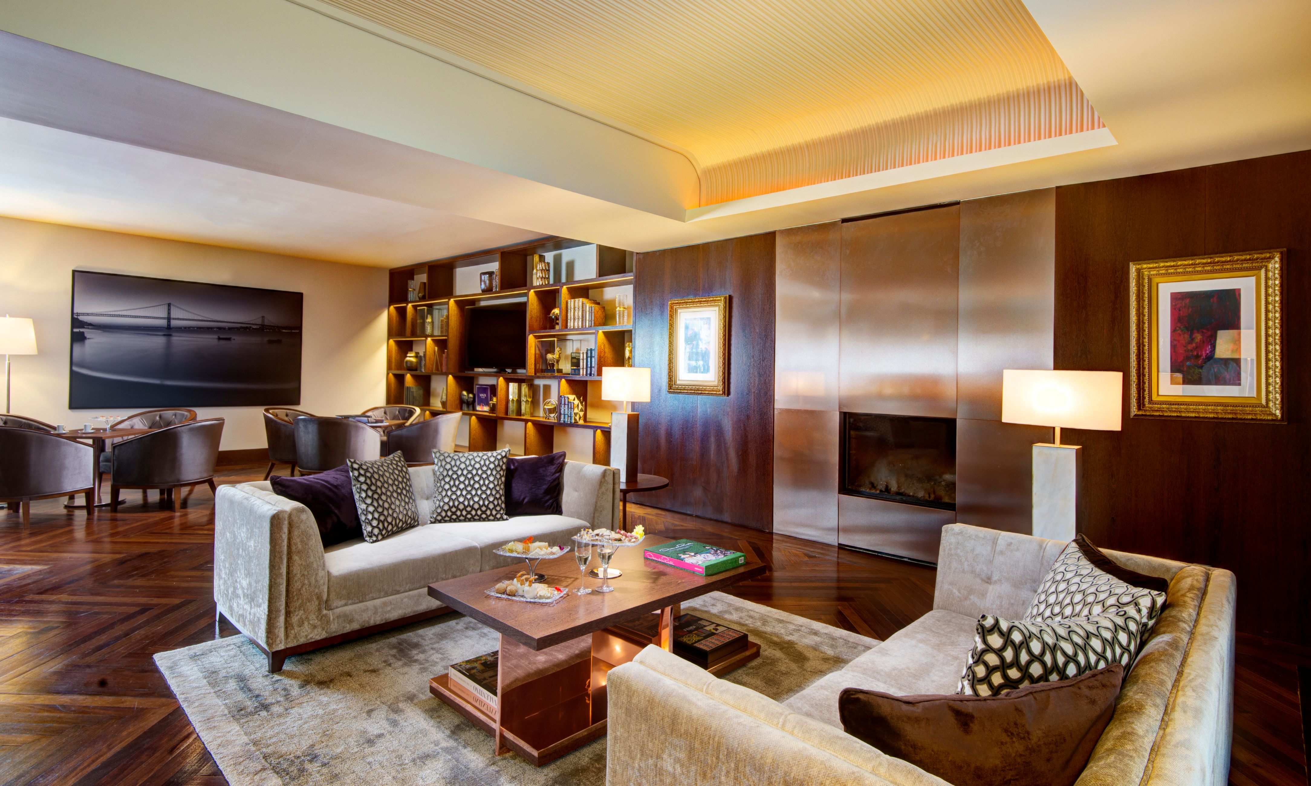 a living room with a fireplace and couches