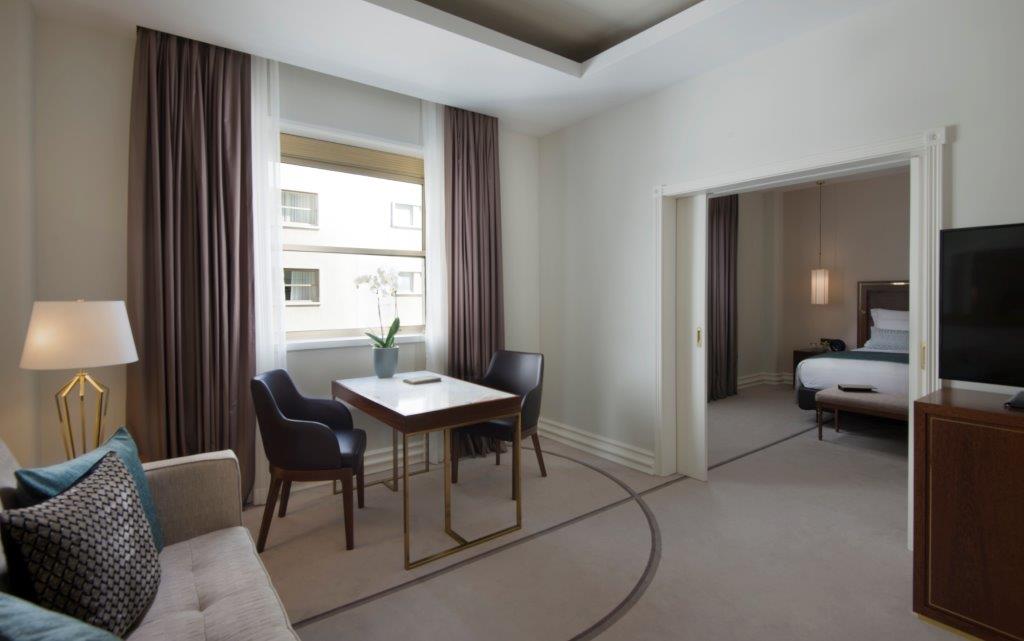 a room with a table and chairs