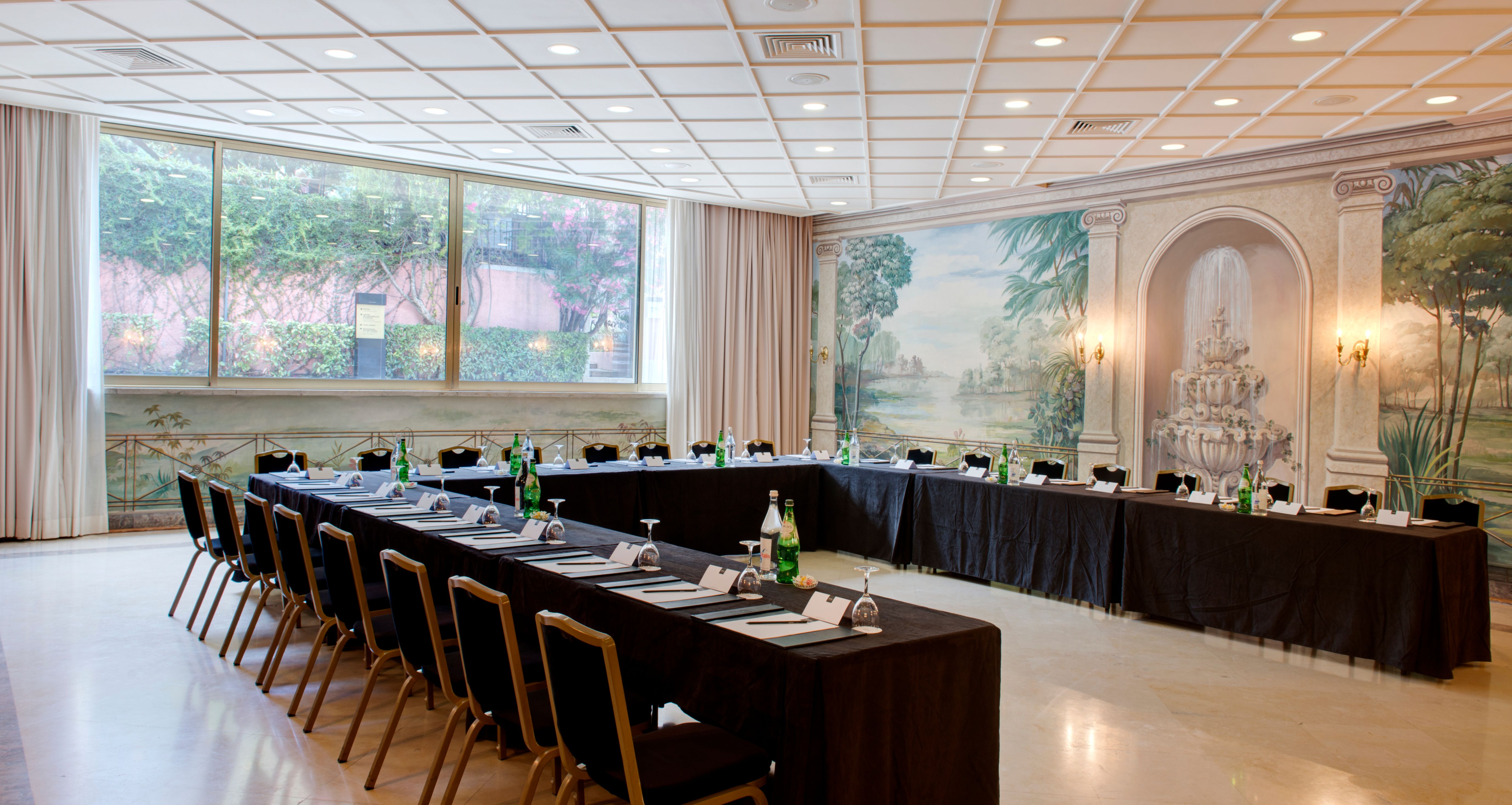 a large room with long tables and chairs