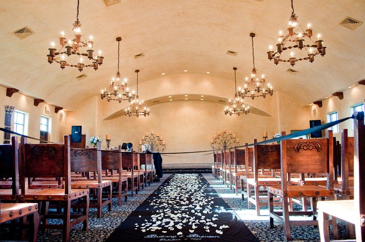 a room with pews and chairs