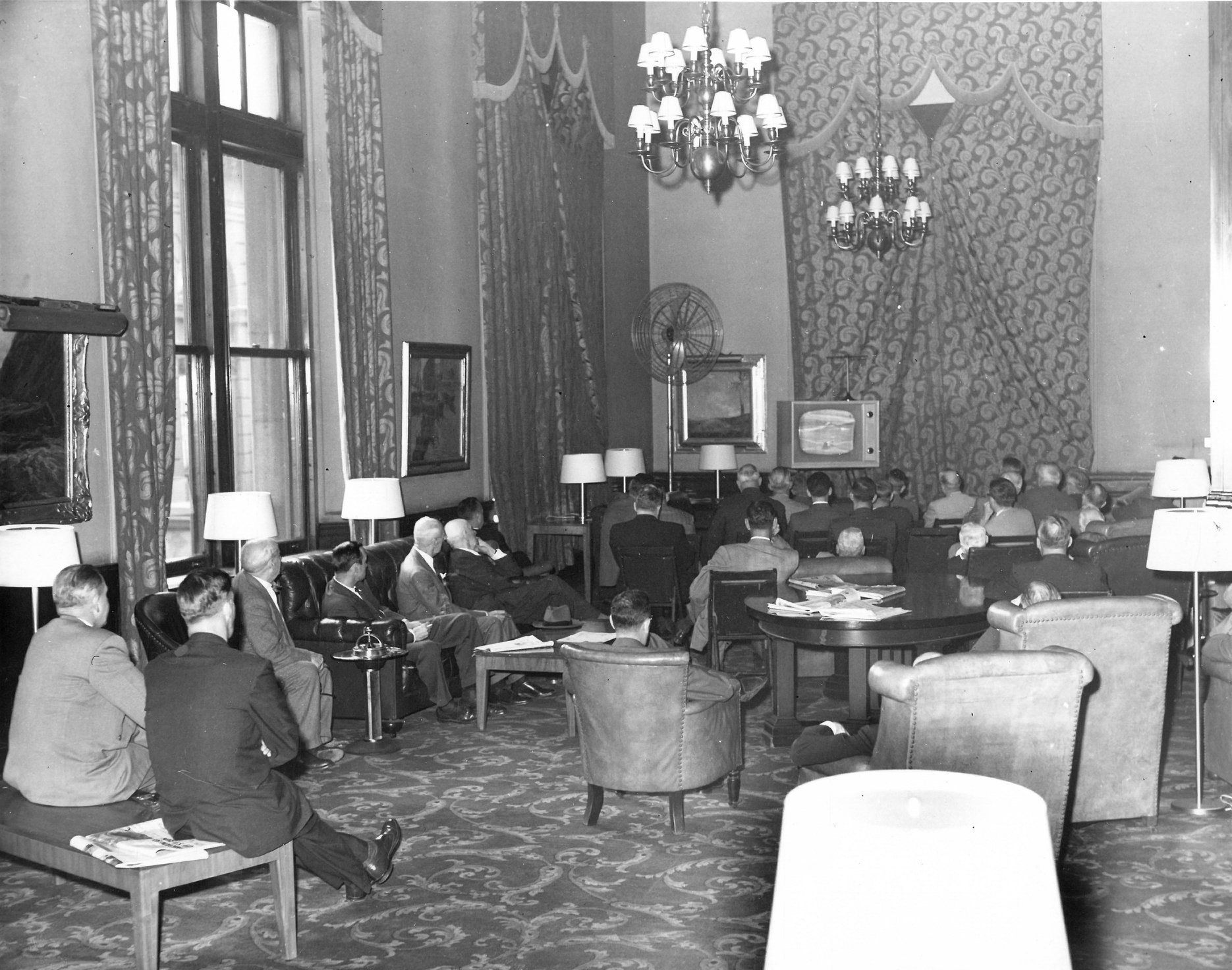 a group of people sitting in a room