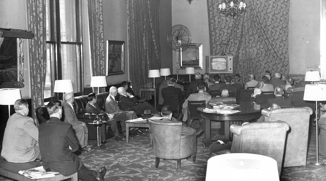 a group of people sitting in a room