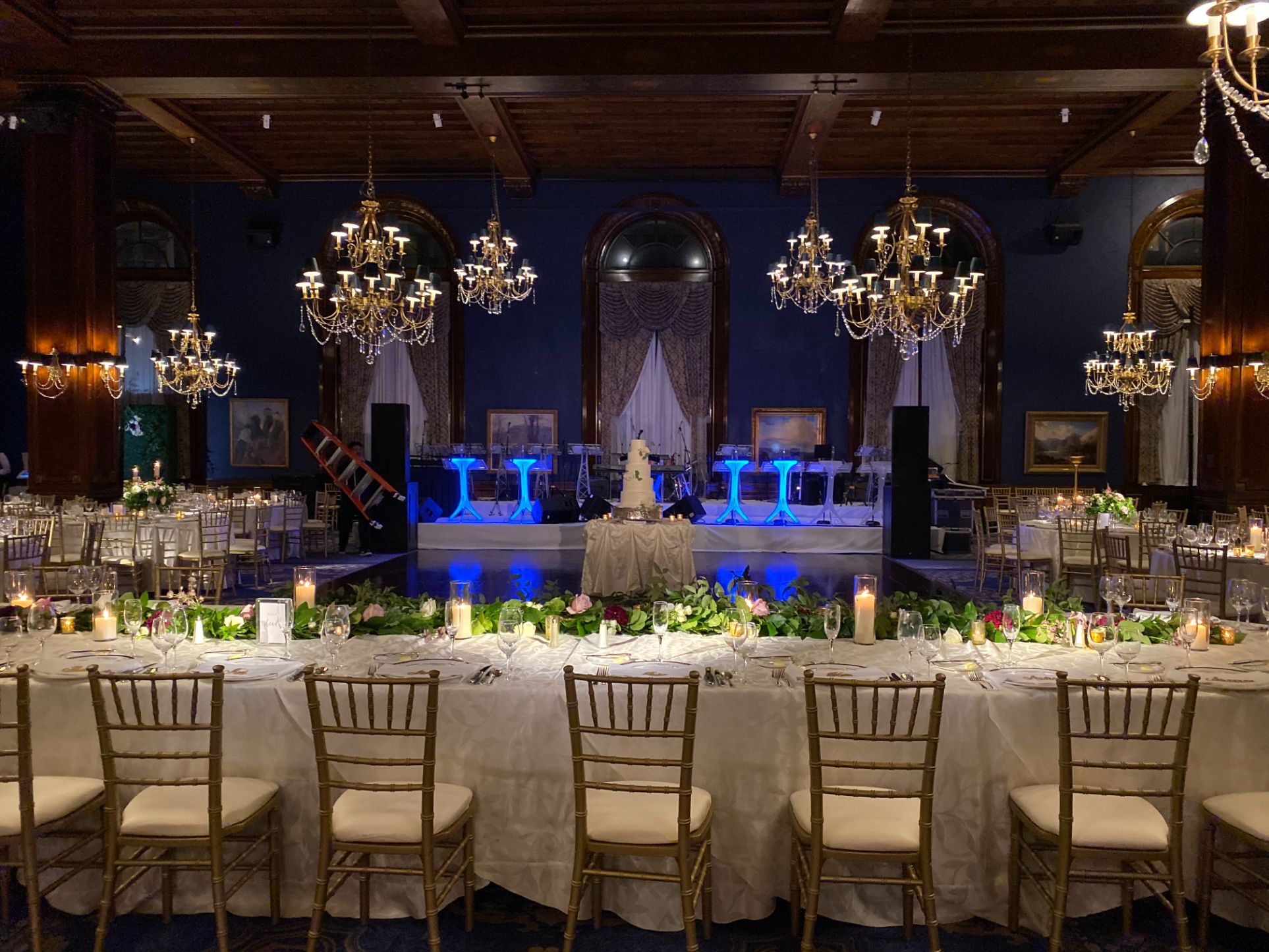a large banquet hall with tables and chairs