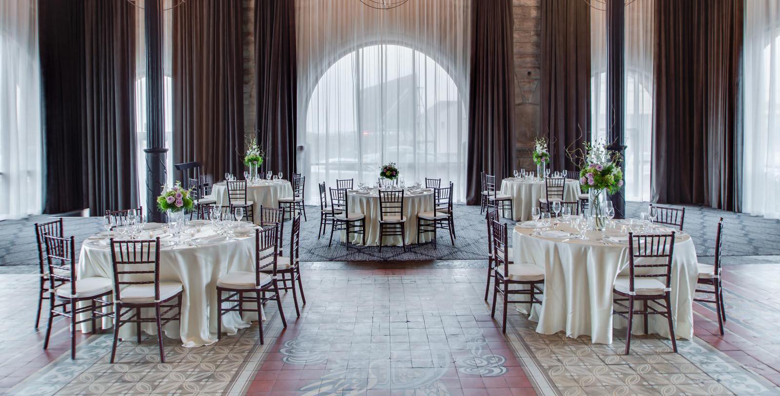 a room with tables and chairs