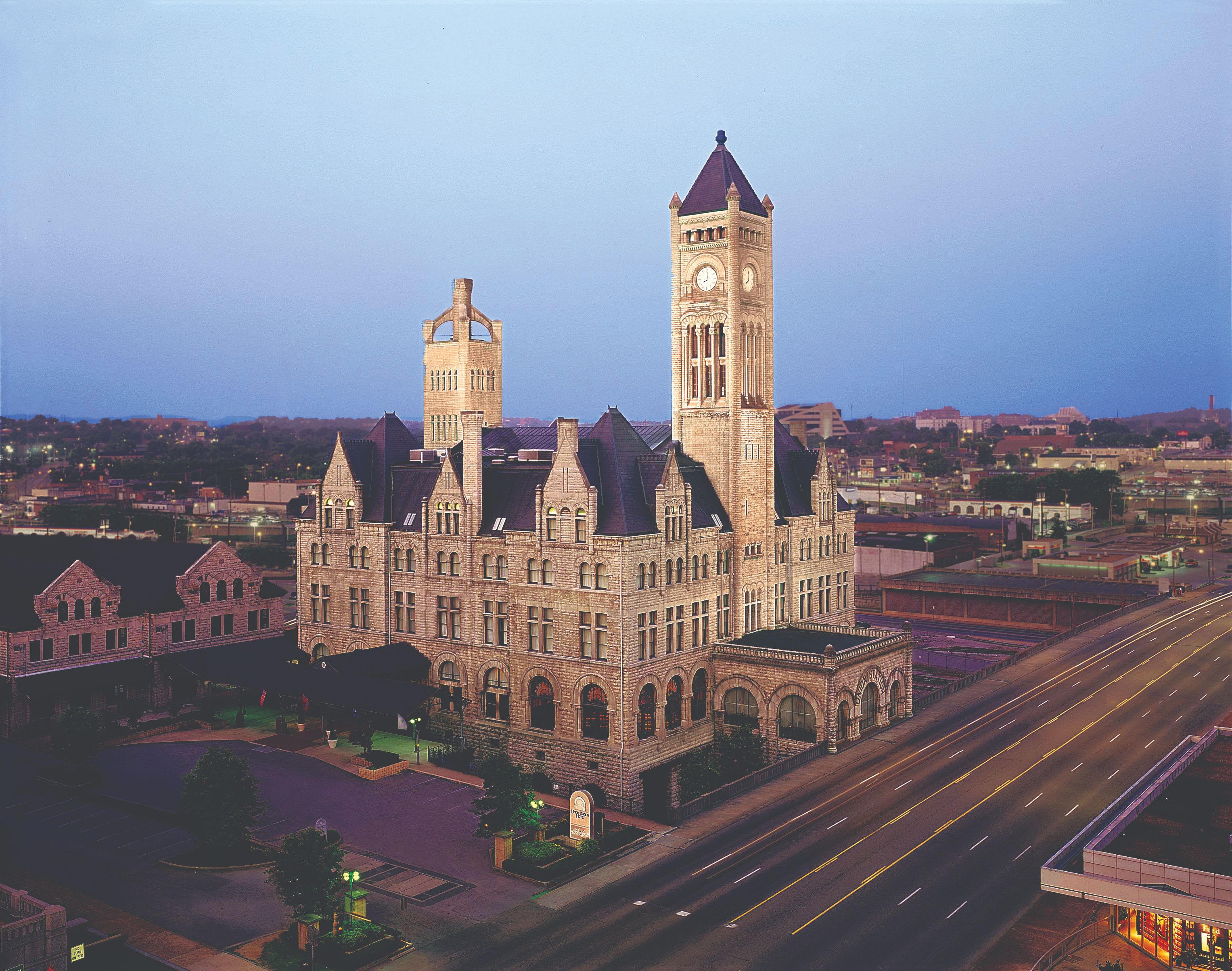 a large stone building with a clock tower