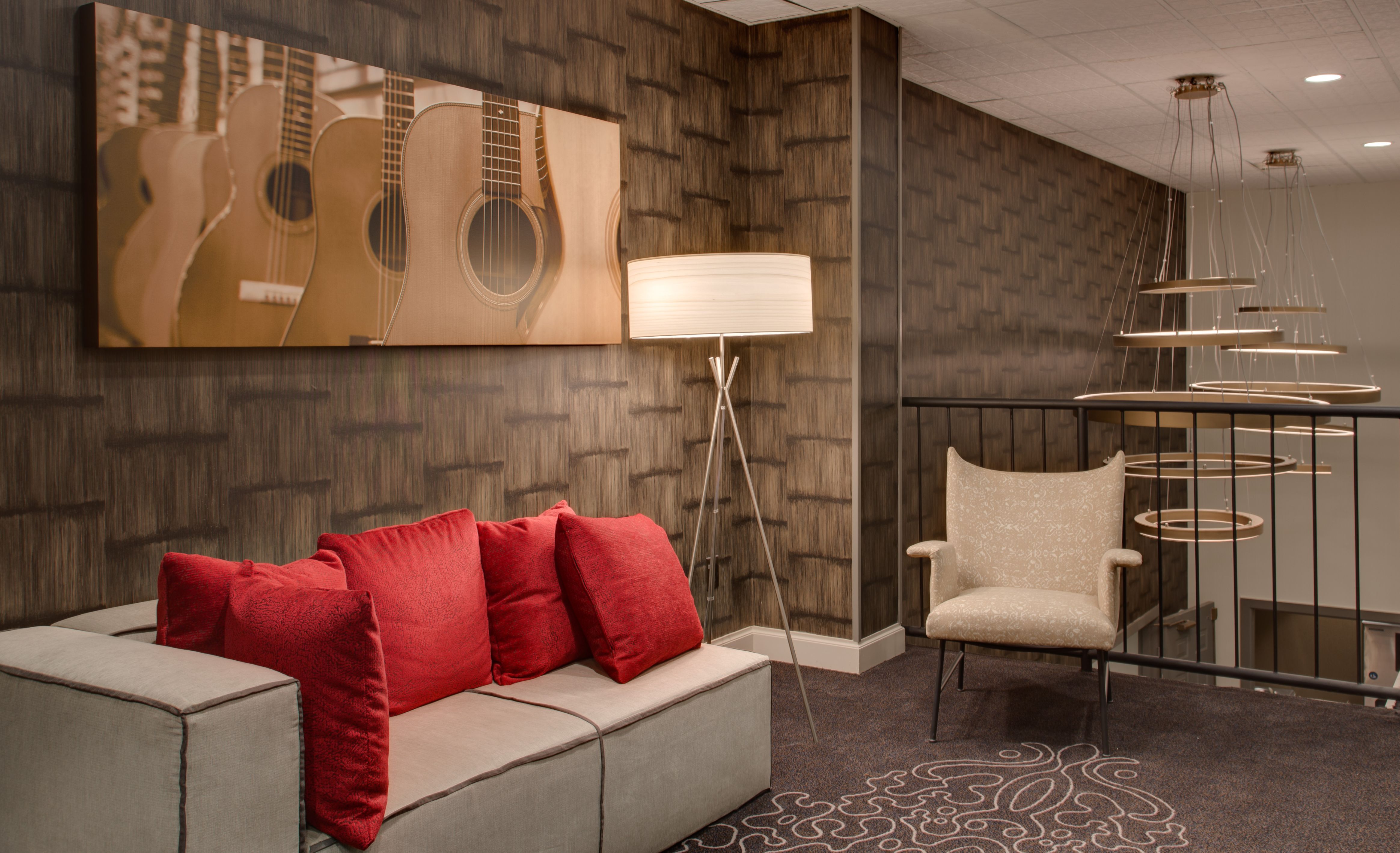a room with a couch and a lamp