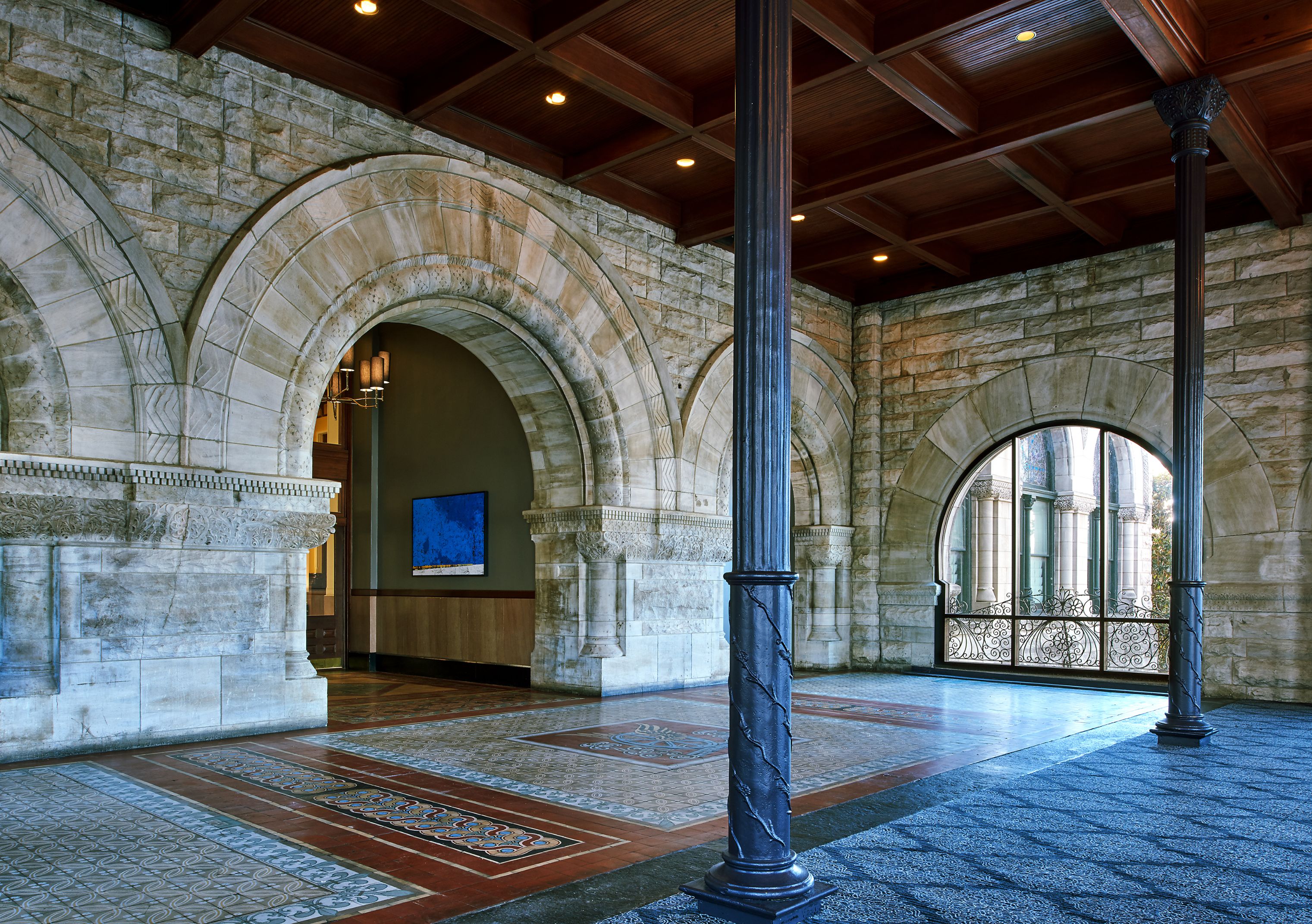 a stone building with arched windows