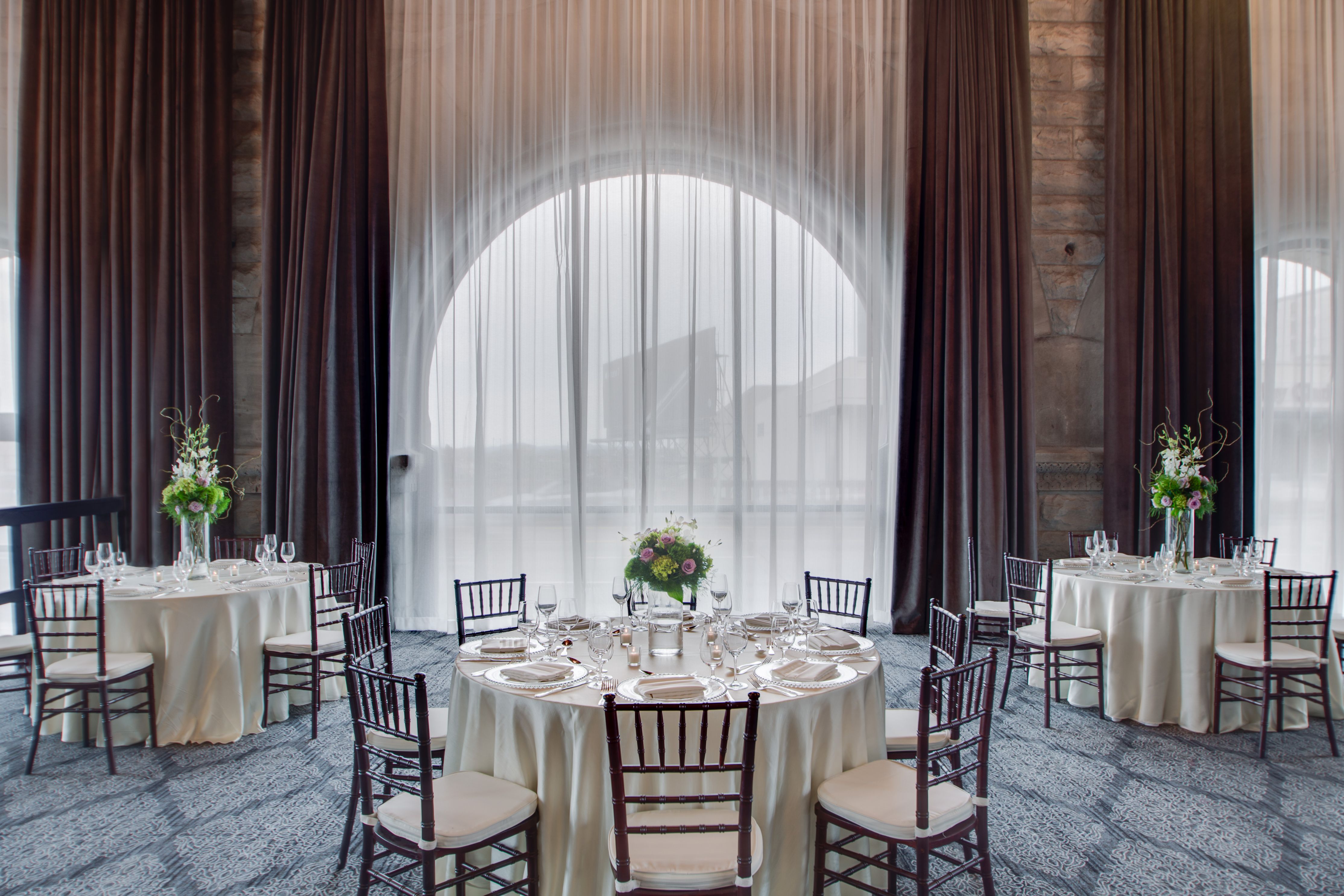 a round table set for a wedding reception