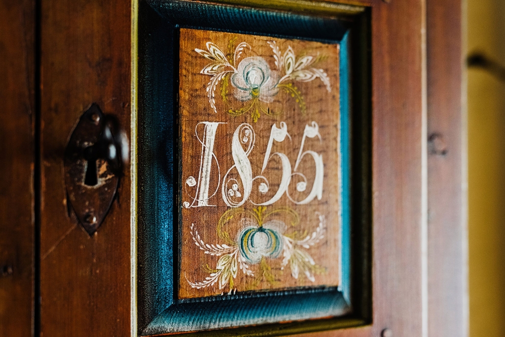 a wood box with a number painted on it