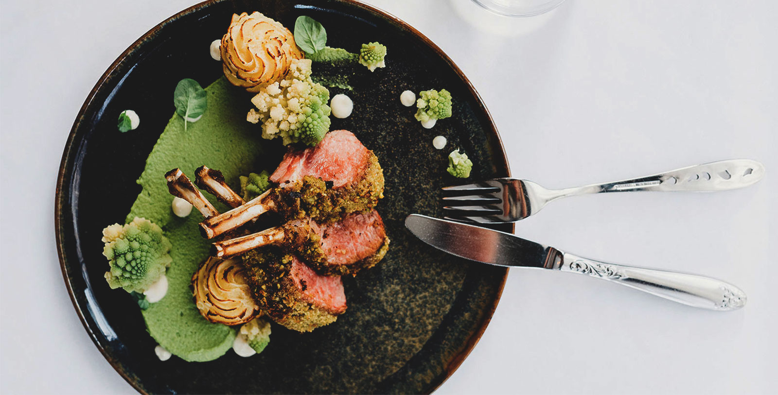 a plate of food with a fork and knife