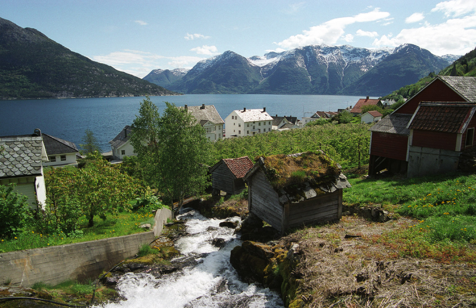 a small houses by a river