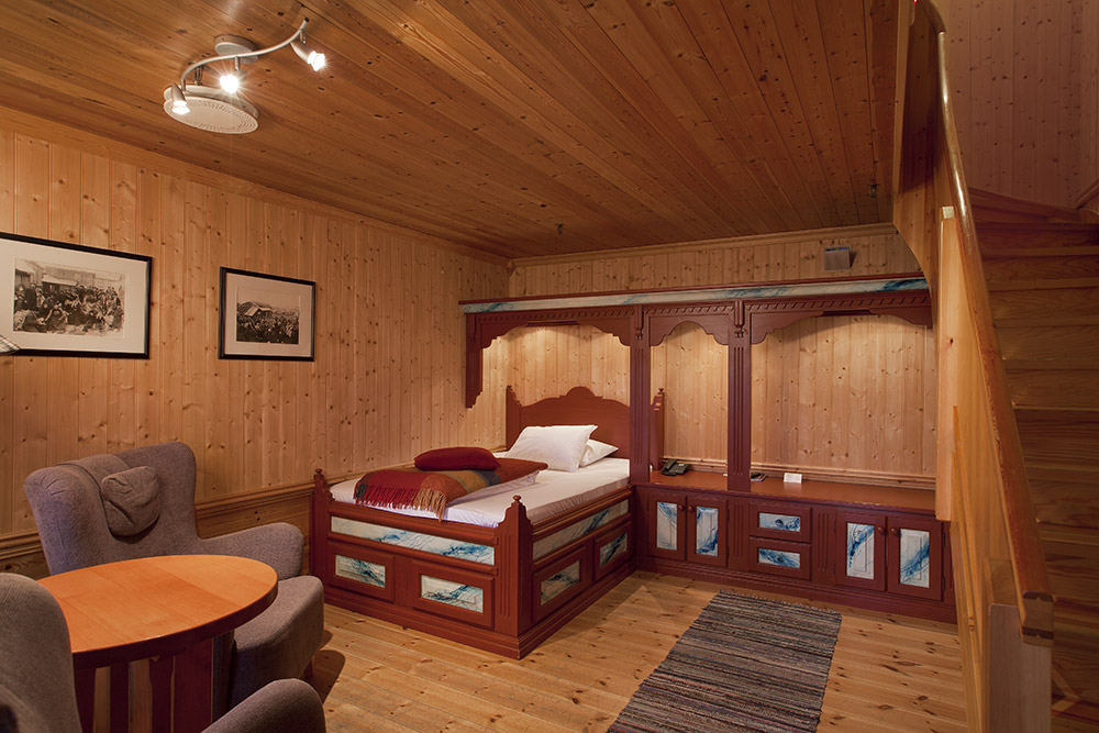 a room with a bed and a table