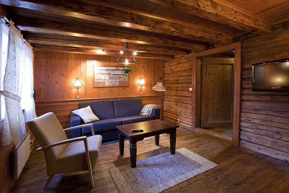 a living room with a couch and a table