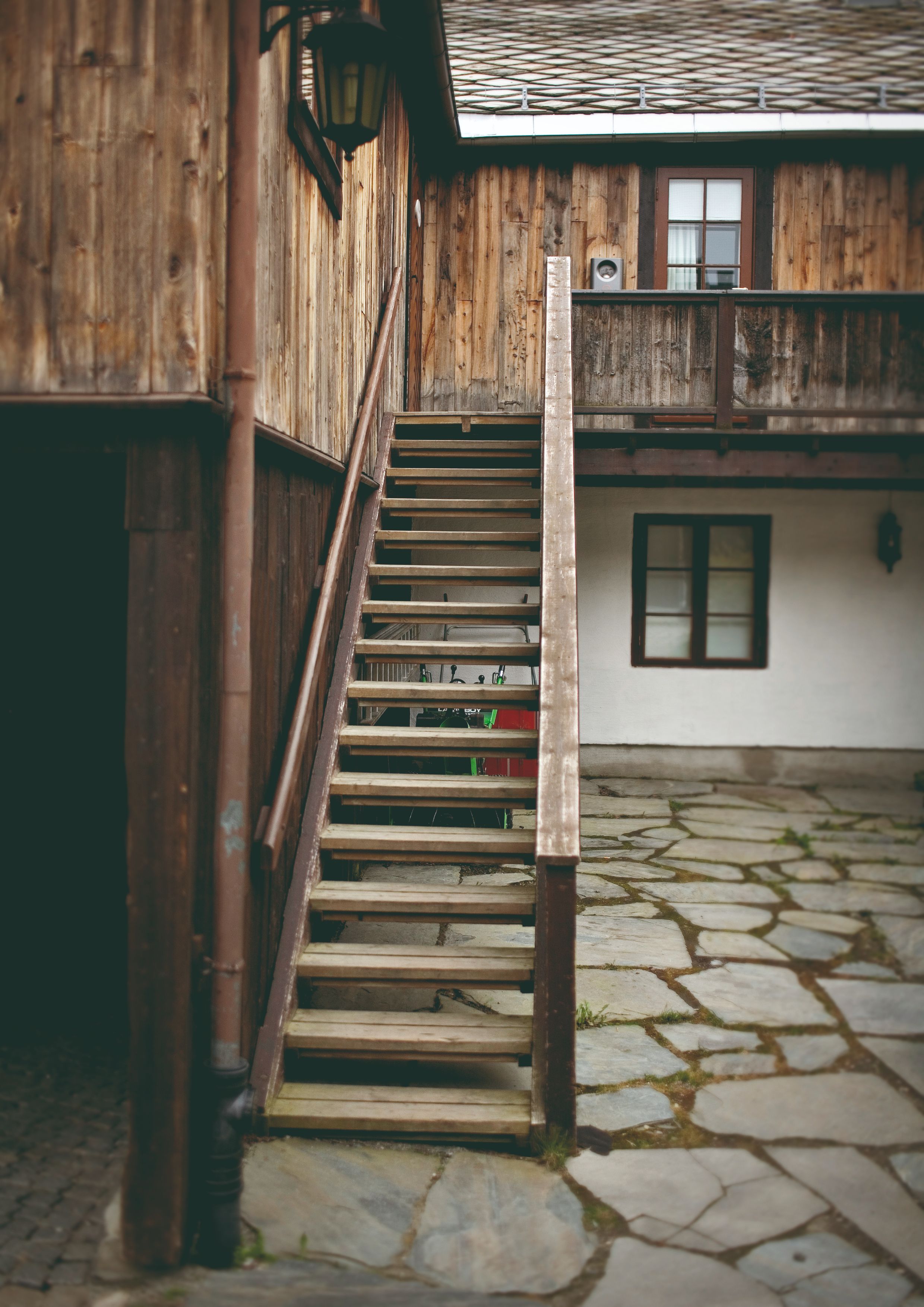 a wooden stairs outside a building