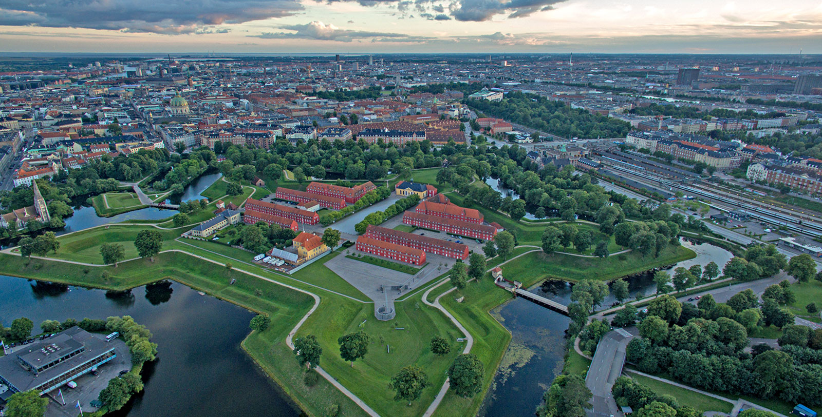 a city with many buildings and a river
