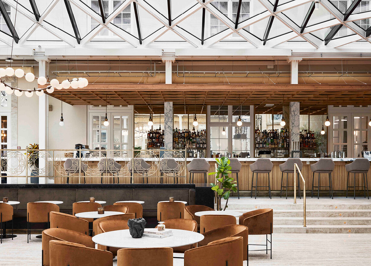 a restaurant with tables and chairs