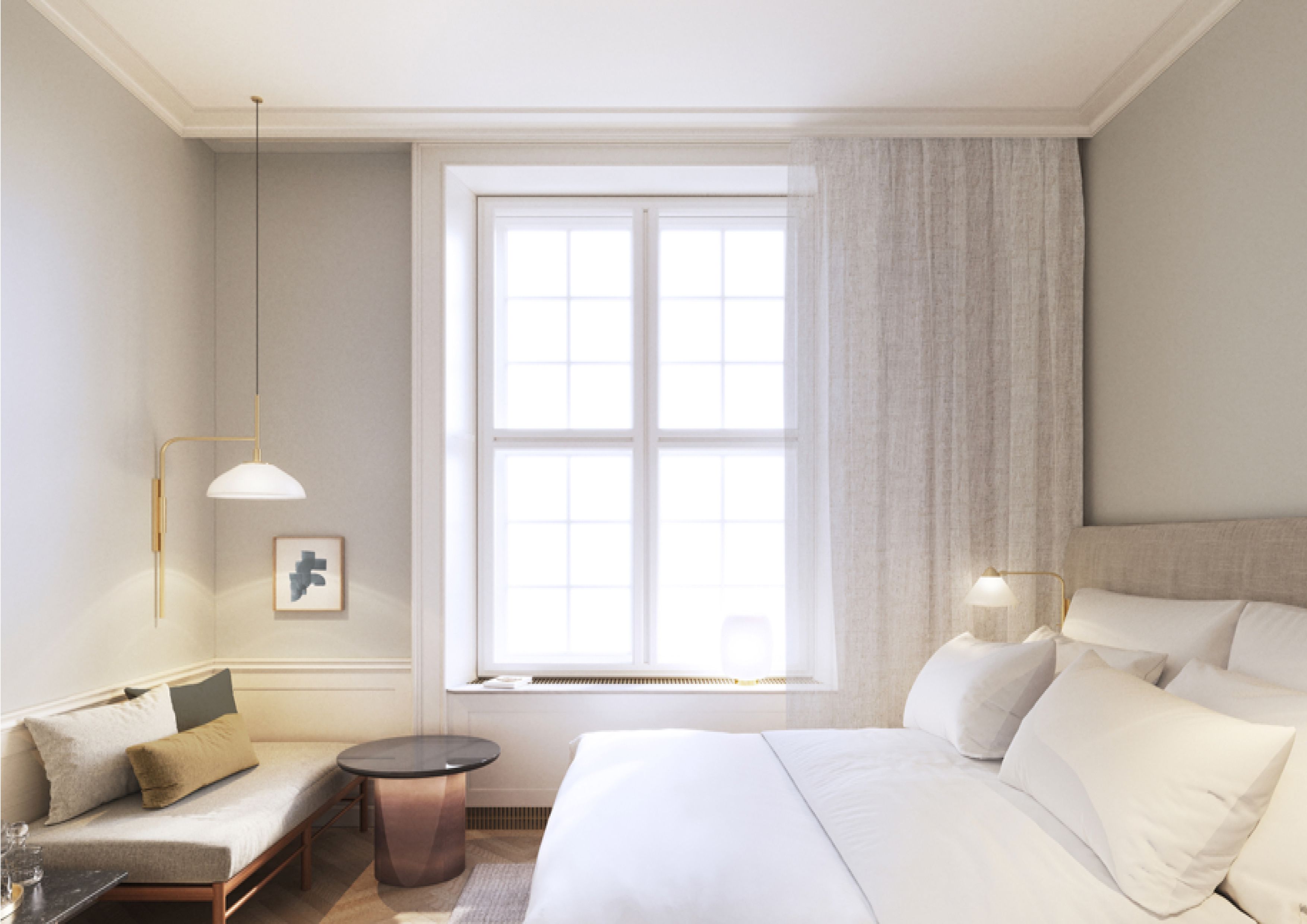 a bed with pillows and a bench in a room