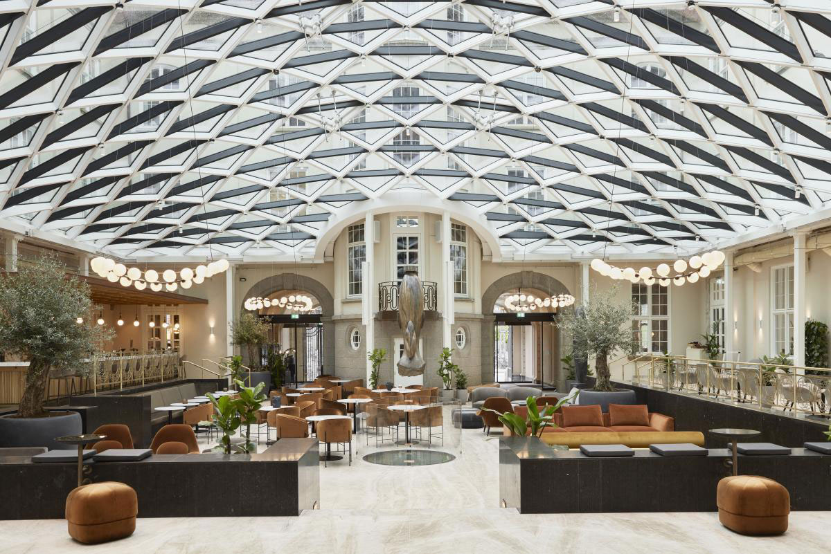 a large room with a glass roof